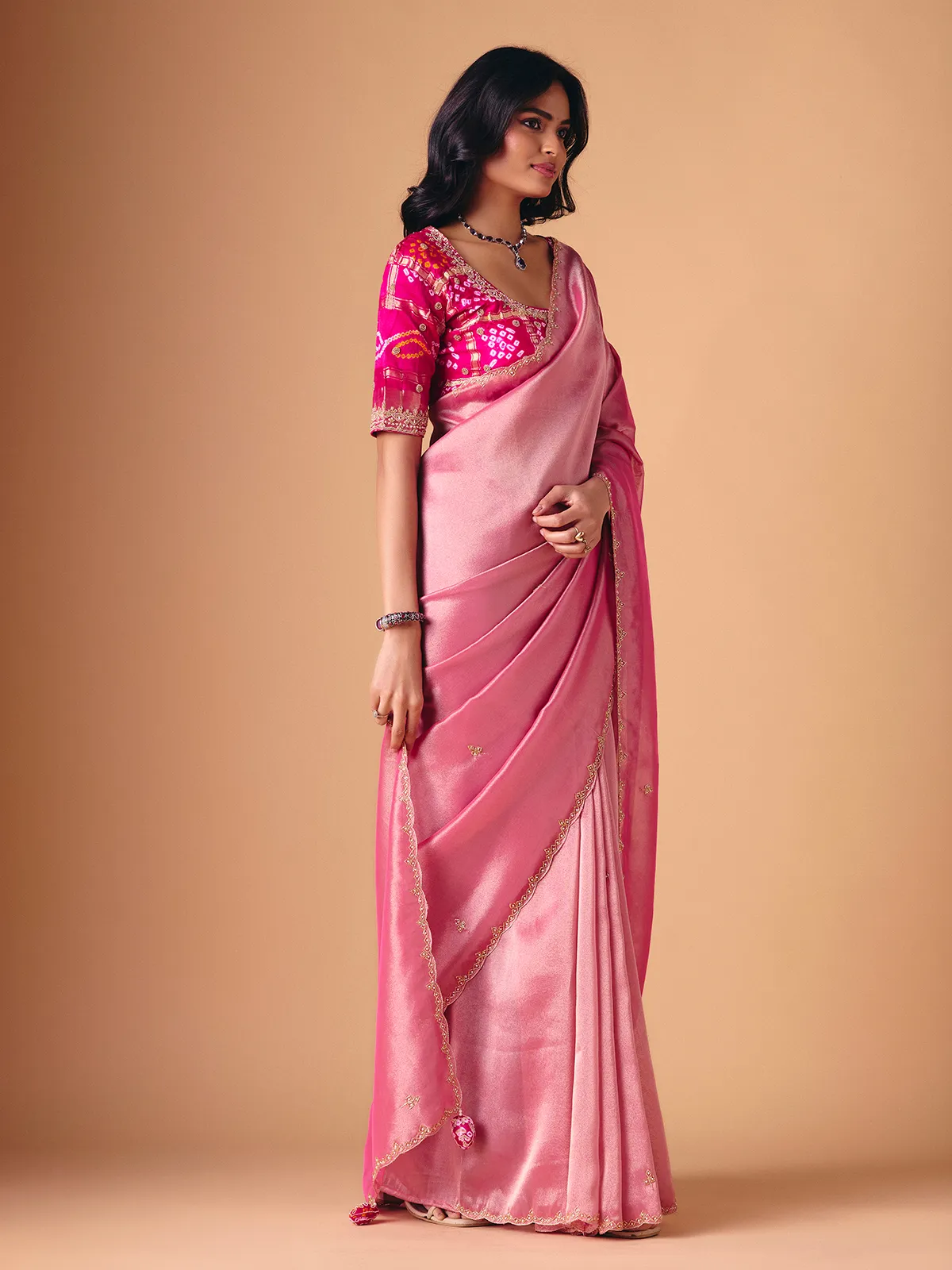 Pink tissue silk designer saree for reception