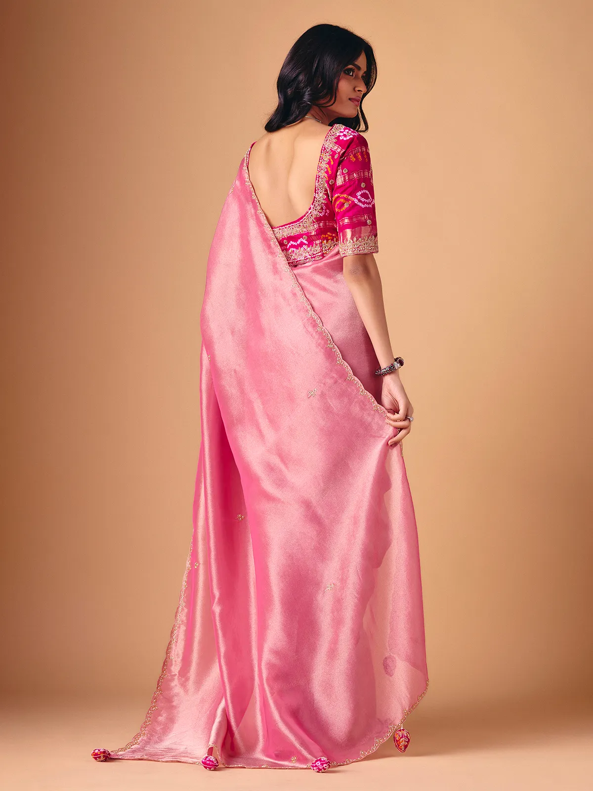 Pink tissue silk designer saree for reception