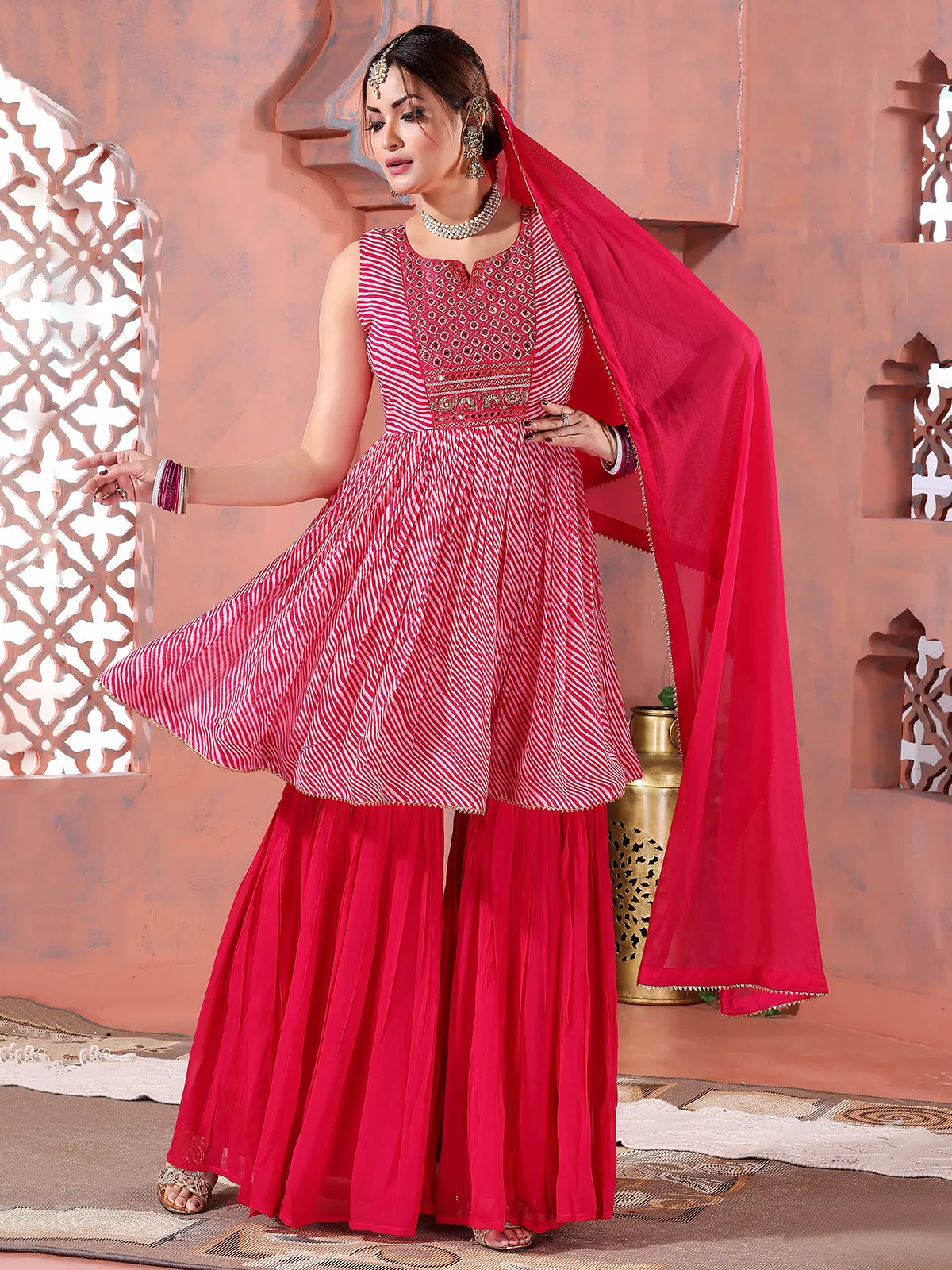 Printed angrakha style magenta georgette sharara suit