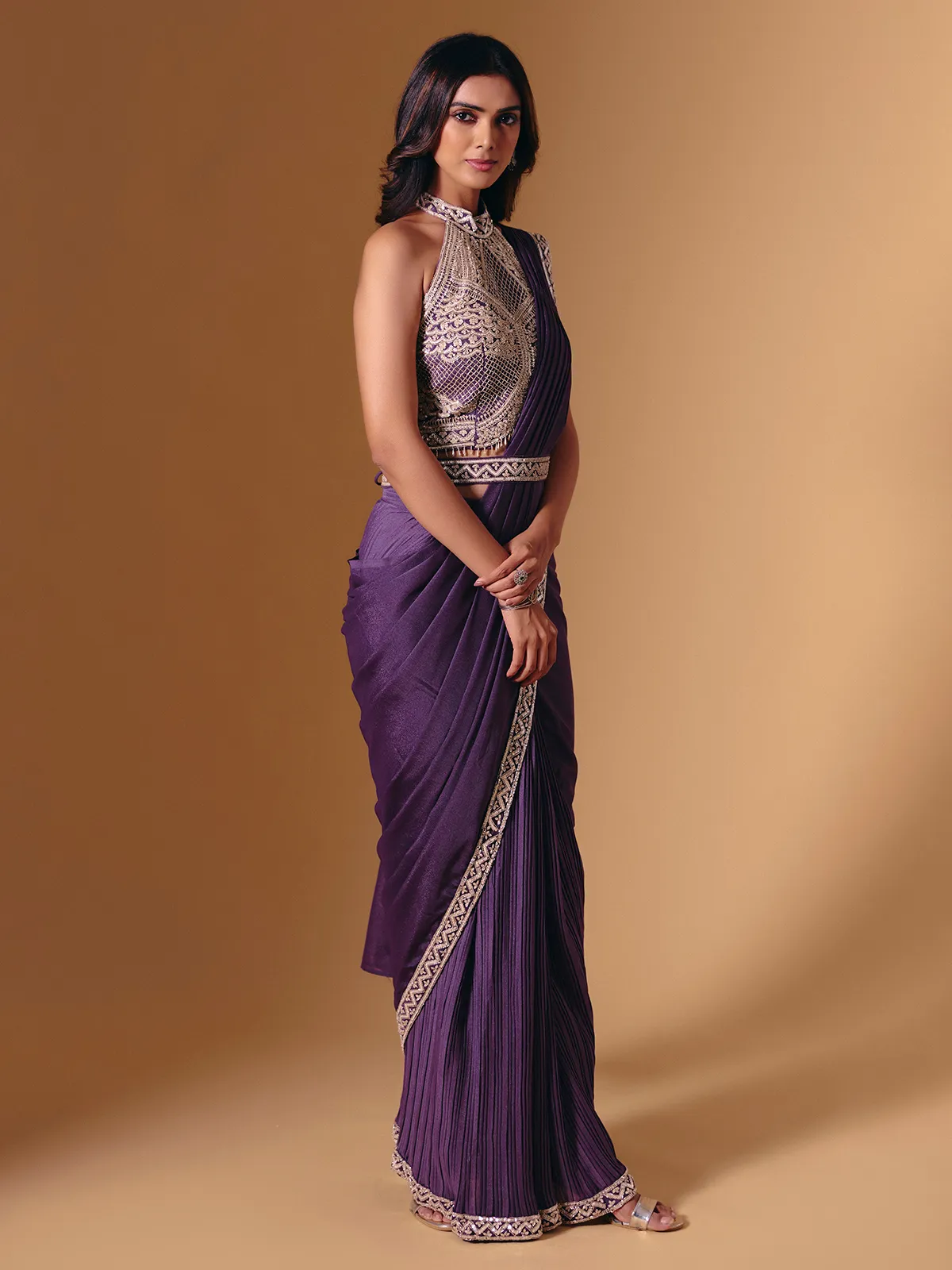Purple cruss lycra saree with sparkling cutdana detailing
