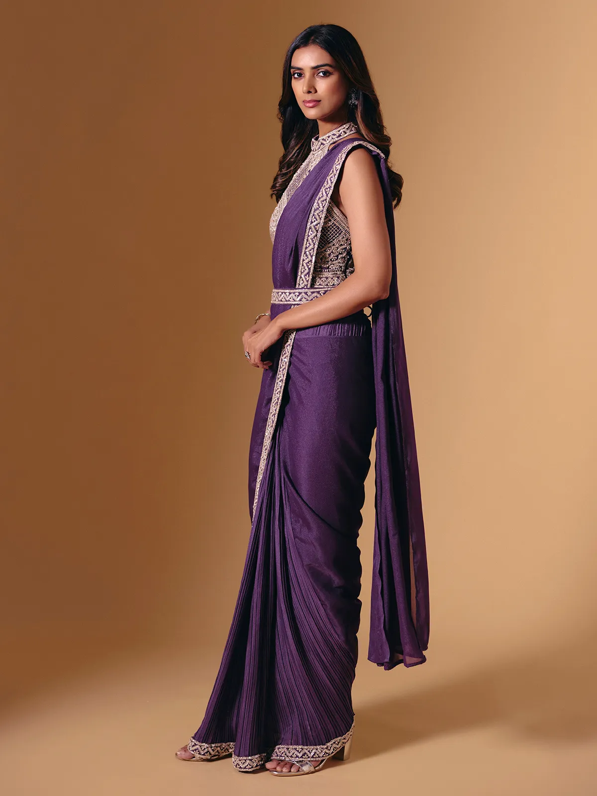 Purple cruss lycra saree with sparkling cutdana detailing