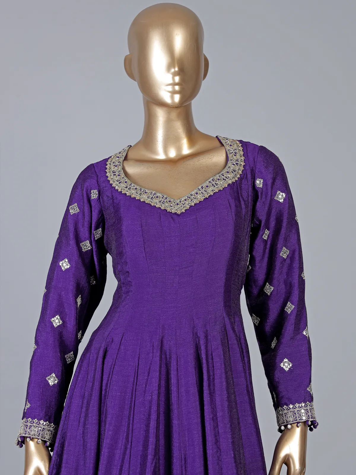Purple silk anarkali suit with pearl embellishments