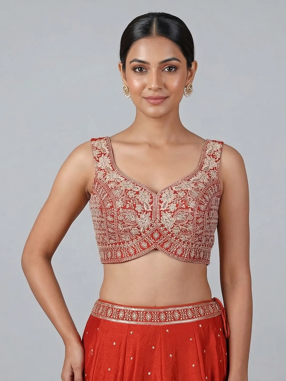 Radiant rust orange silk lehenga choli with embroidered sparkle