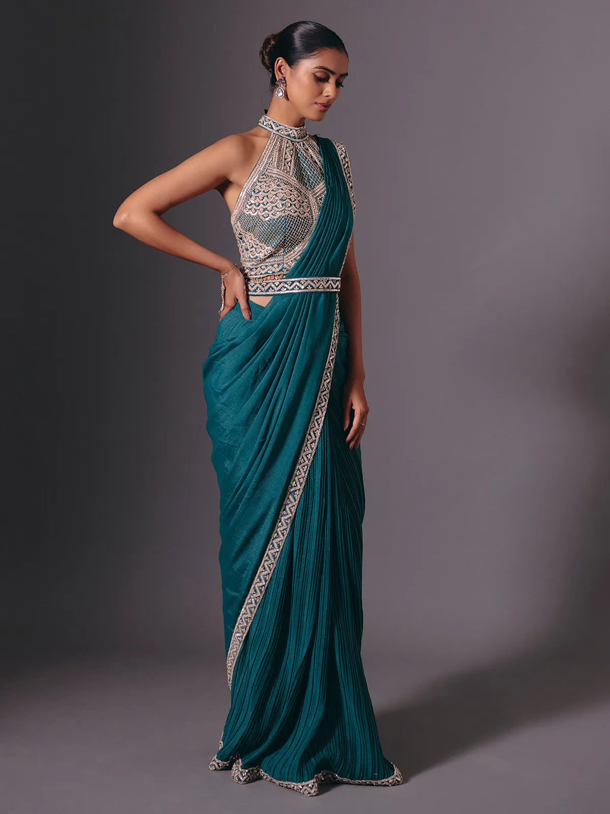Rama green cruss lycra saree with designer belt