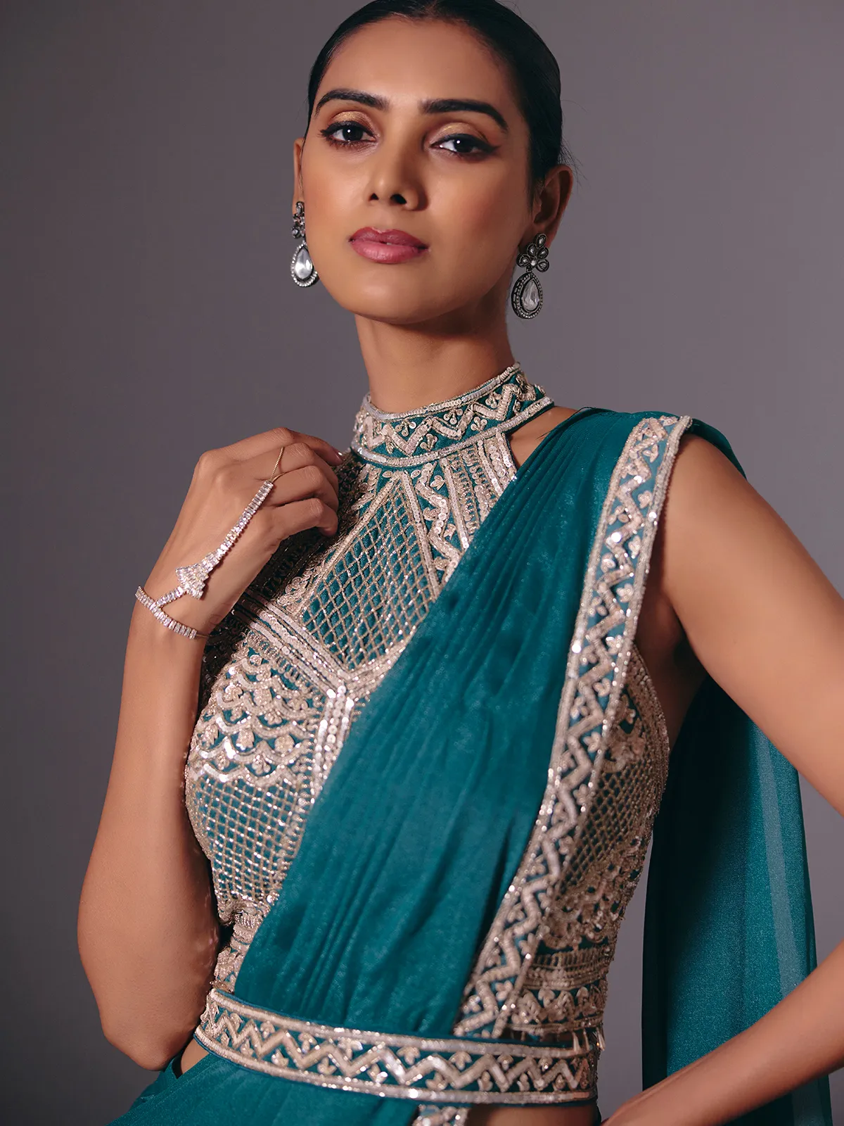 Rama green cruss lycra saree with designer belt