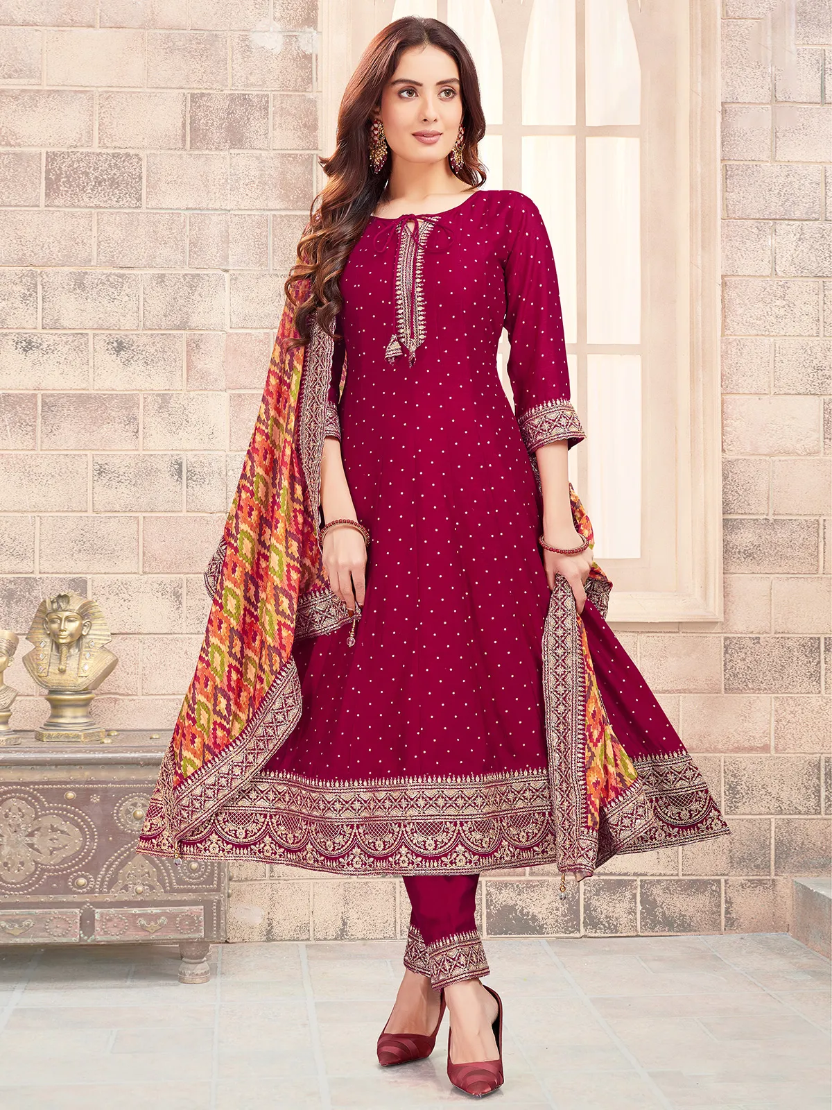 Rani color silk salwar suit with dupatta