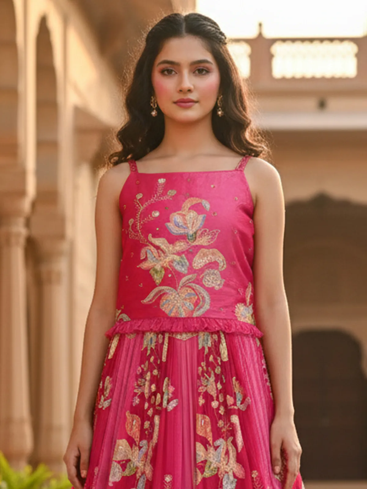 Rani pink chiffon lehenga choli with sleeveless choli