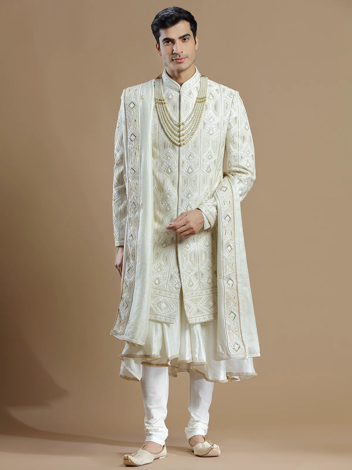 Raw silk groom sherwani in cream color