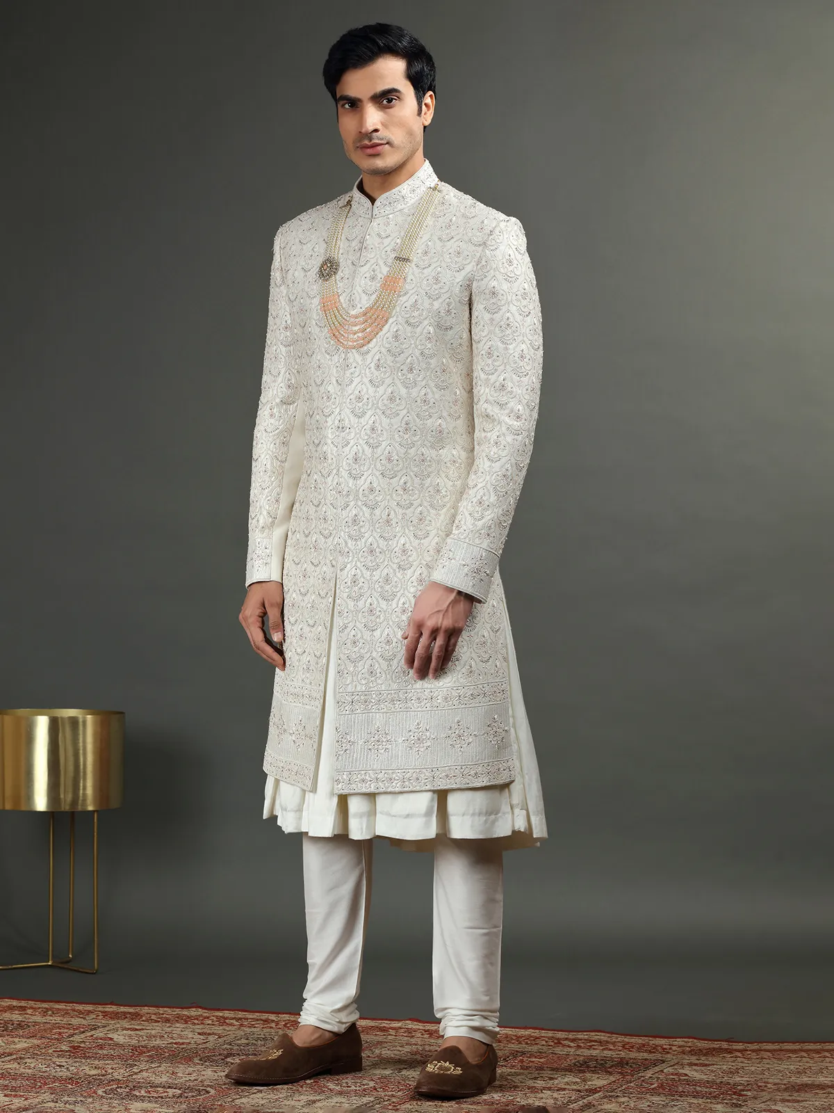 Raw silk groom sherwani in off white