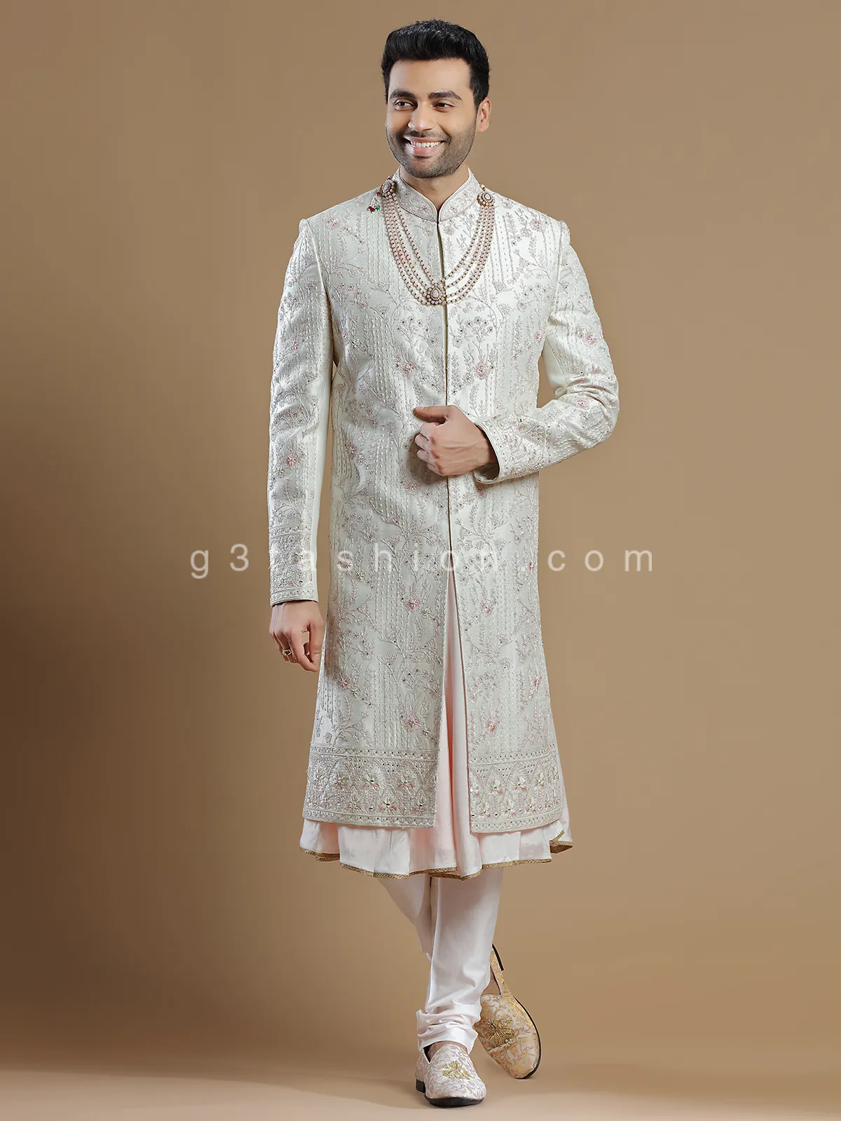 Raw silk groom wear sherwani in off white color