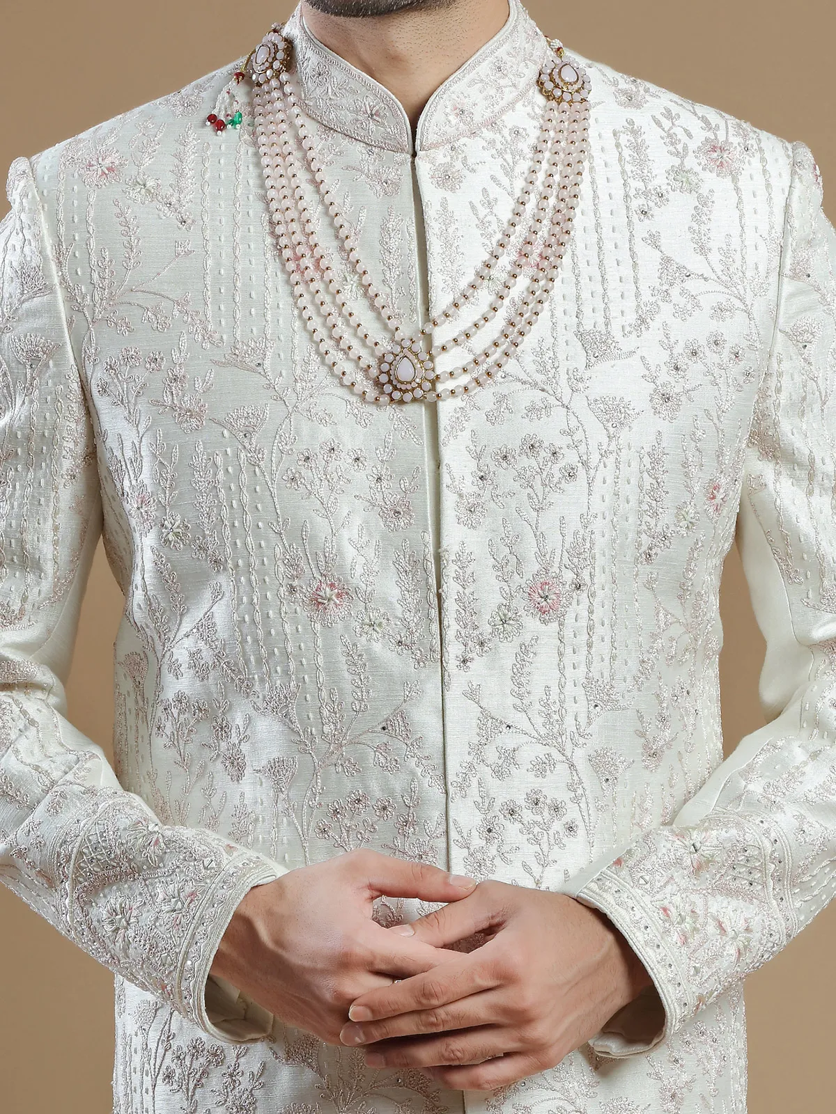 Raw silk groom wear sherwani in off white color