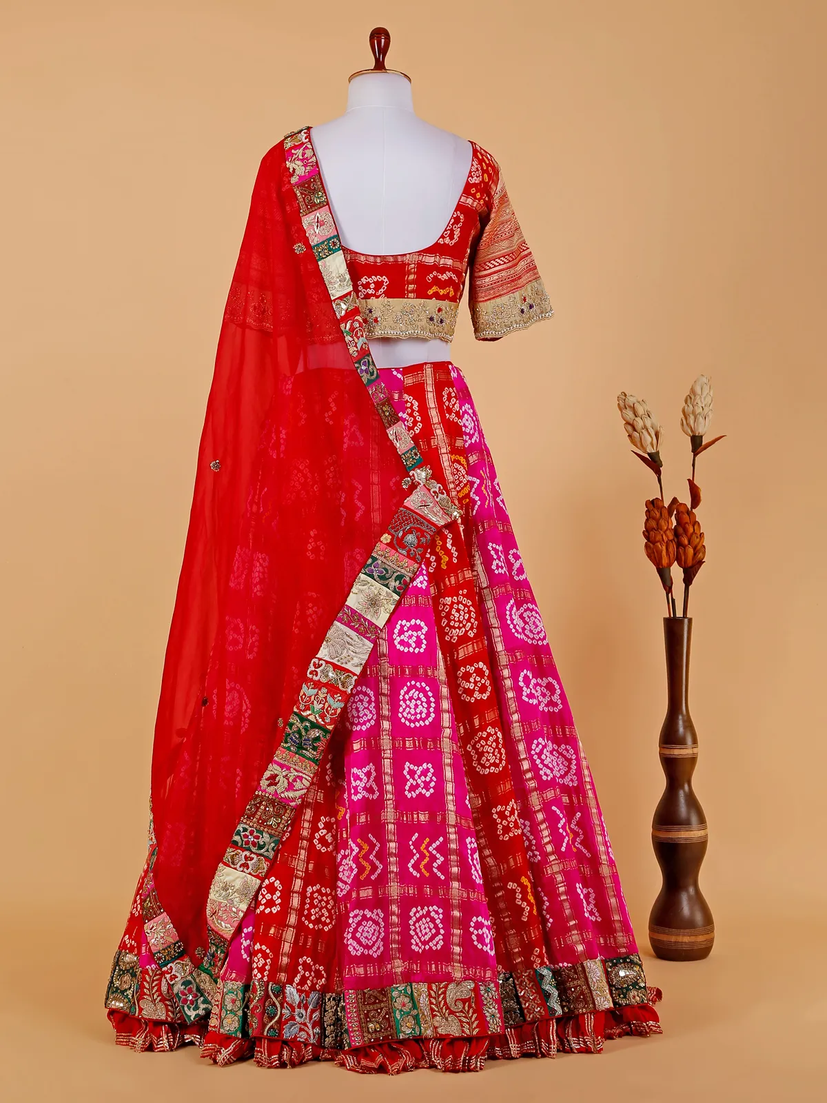 Red and magenta bandhej lehenga choli