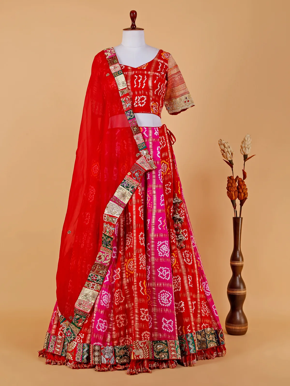 Red and magenta bandhej lehenga choli