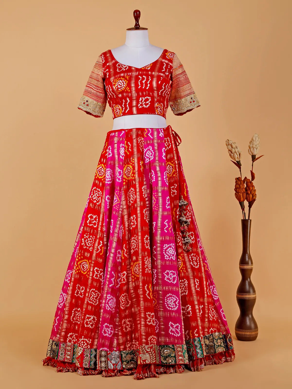 Red and magenta bandhej lehenga choli