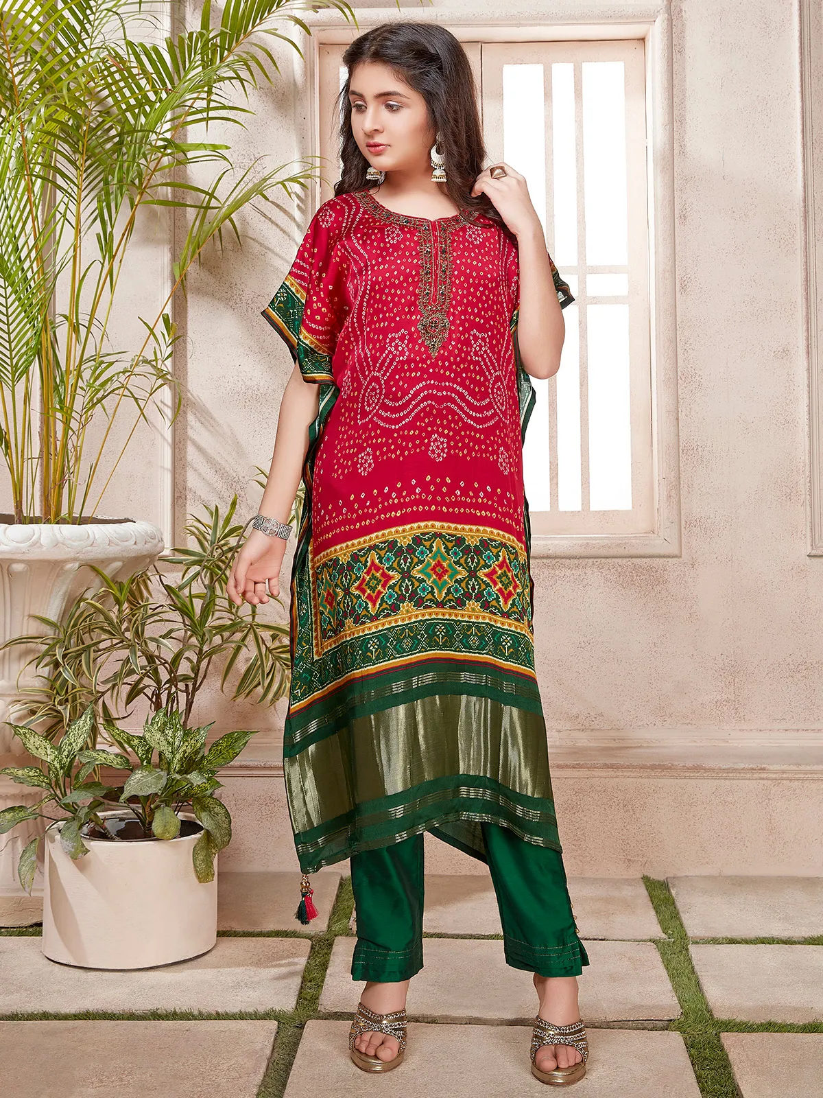 Red hued silk bandhej print salwar suit