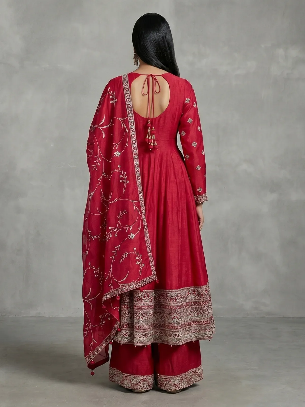 Red silk anarkali suit with pearl embellishments