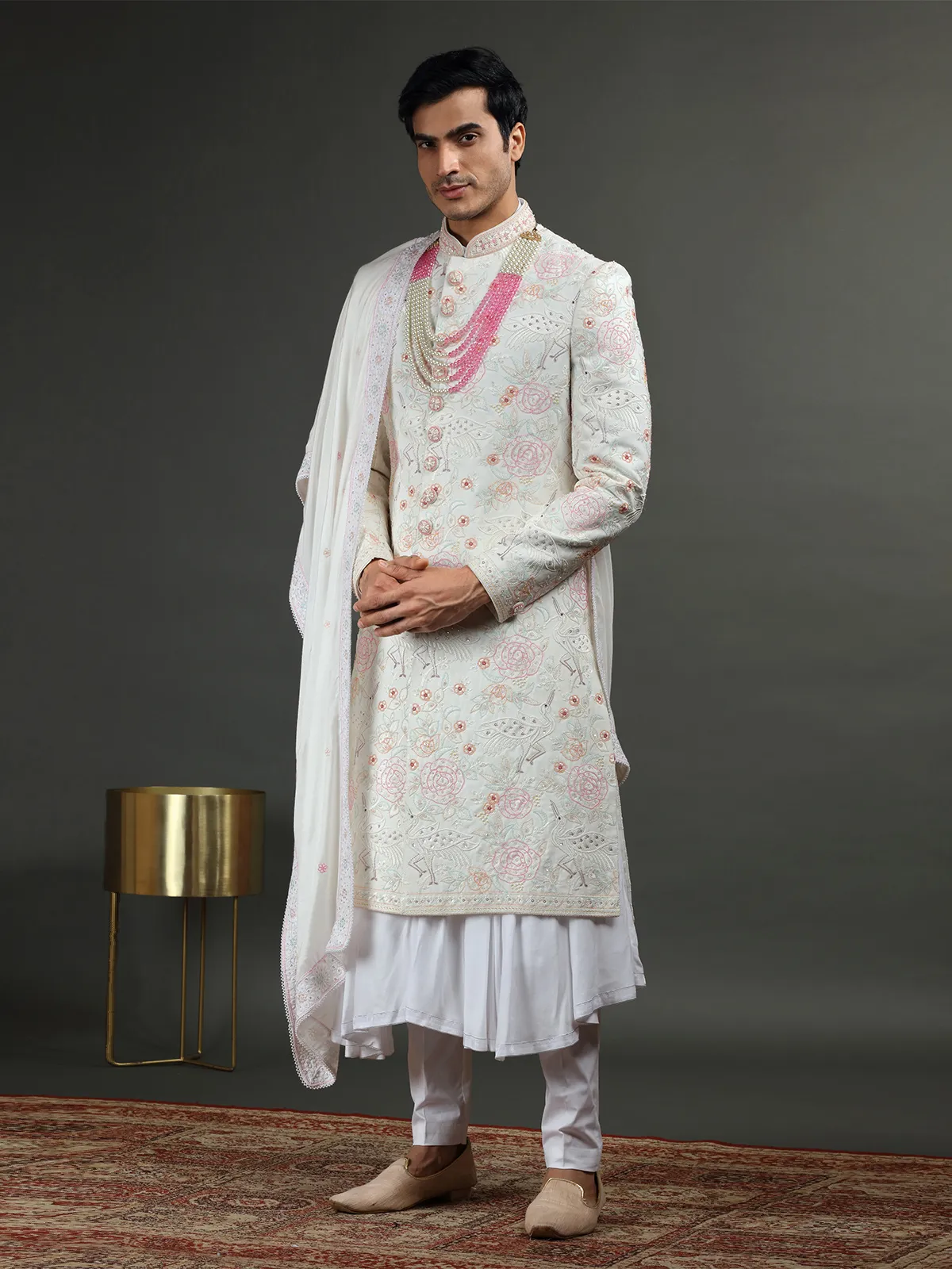 Rich white silk groom sherwani