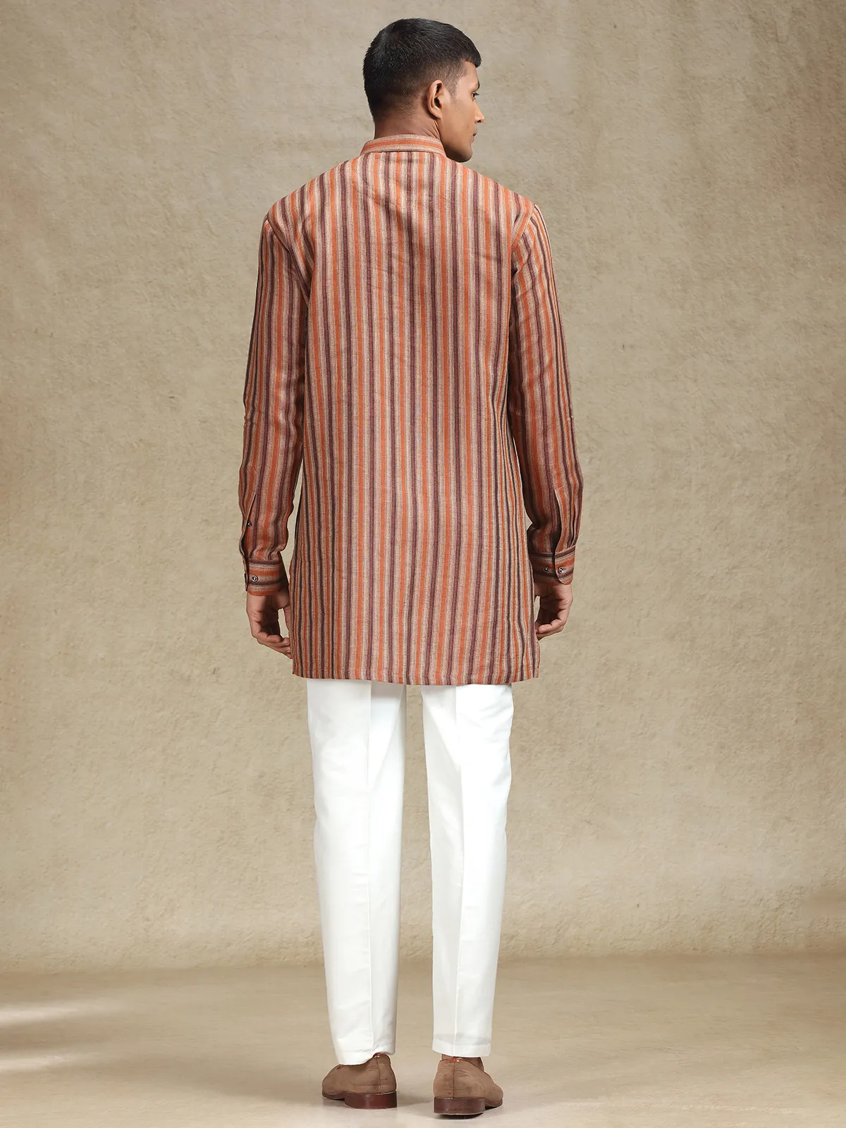 Rust orange and brown kurta pajama set in stripe pattern