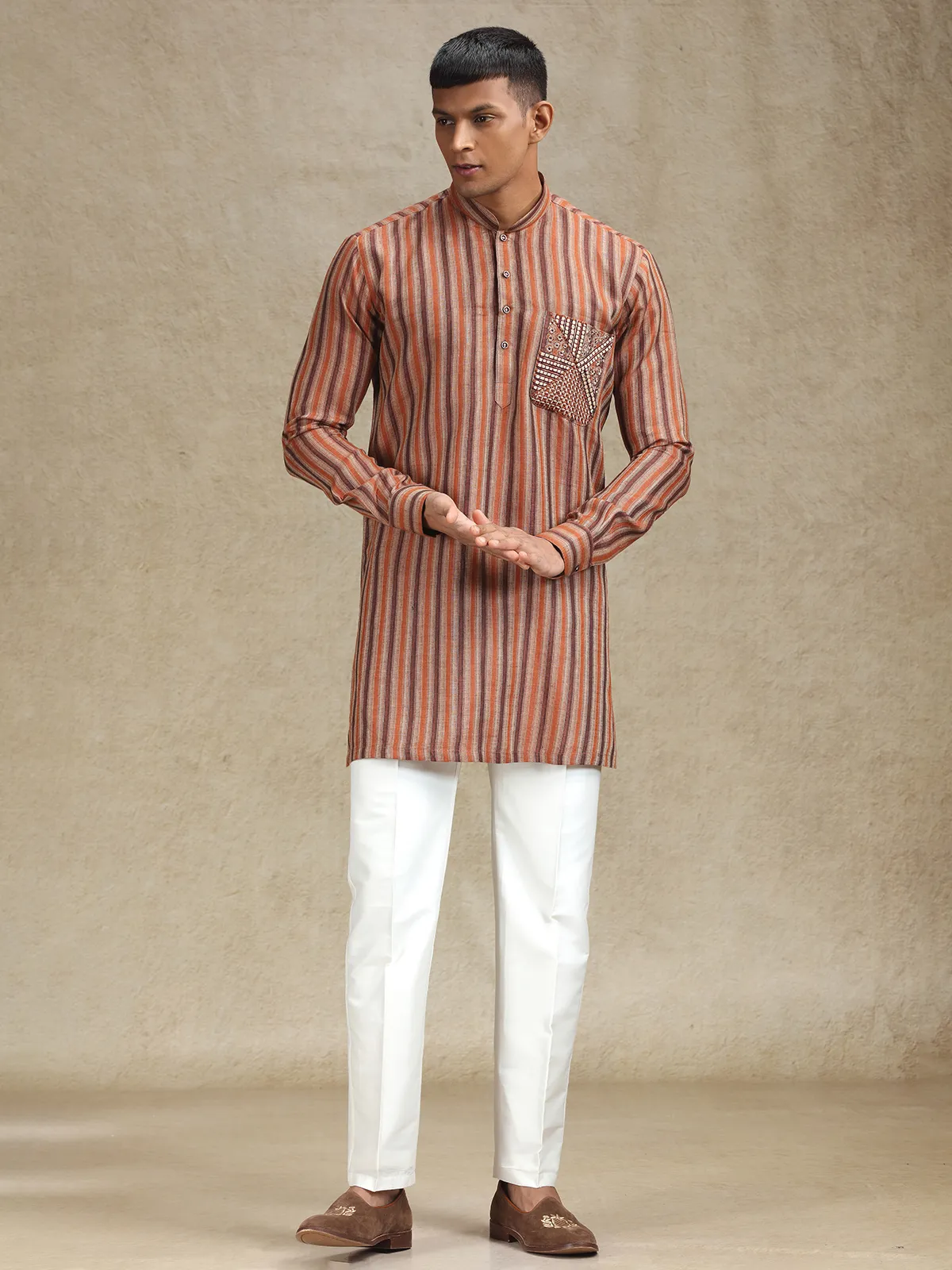 Rust orange and brown kurta pajama set in stripe pattern