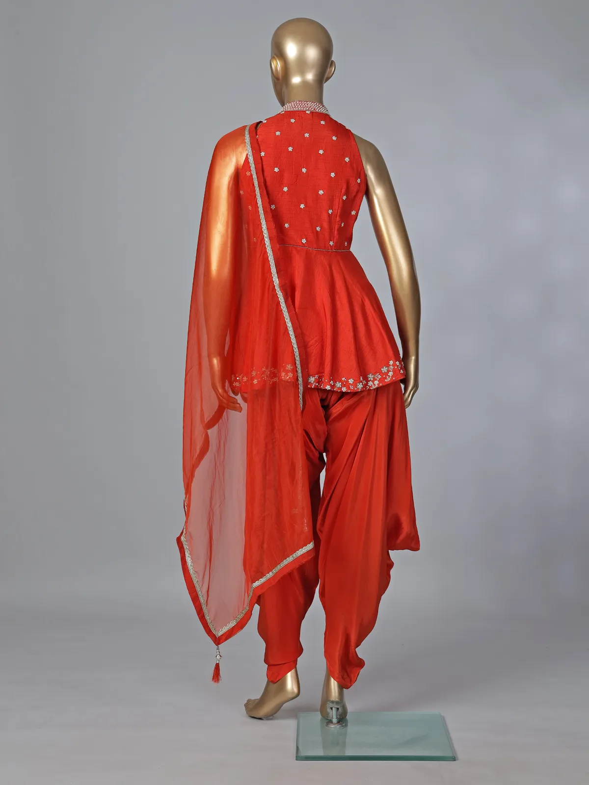 Rust orange designer silk dhoti suit with embellished dupatta