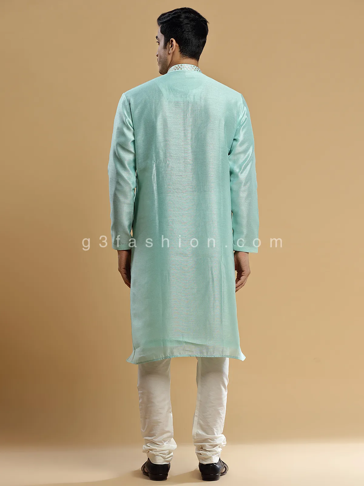 Sea green silk kurta suit for festive look