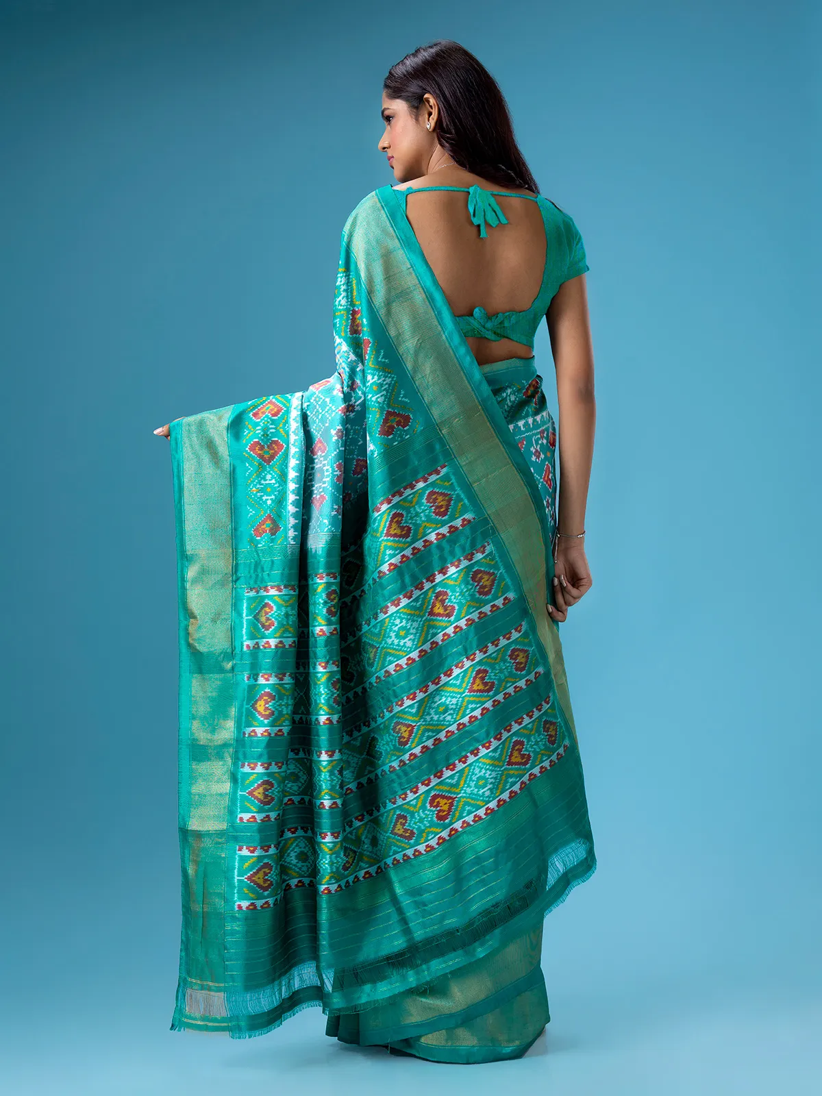 Silk patola printed rama green saree