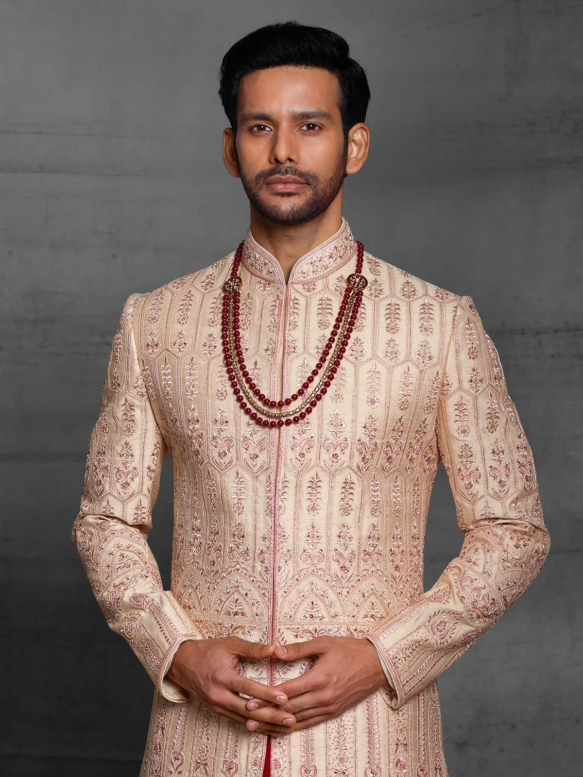 Silk sherwani in peach color for wedding event