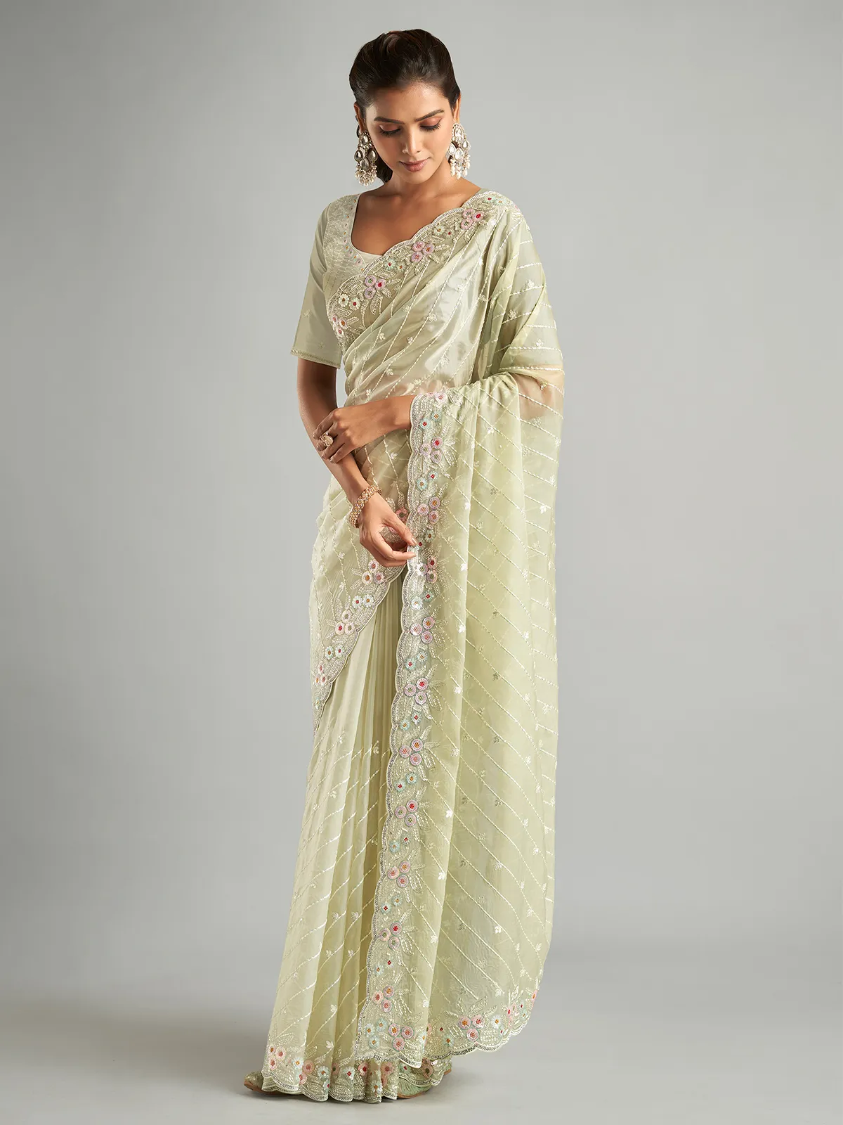 Stunning light green organza saree