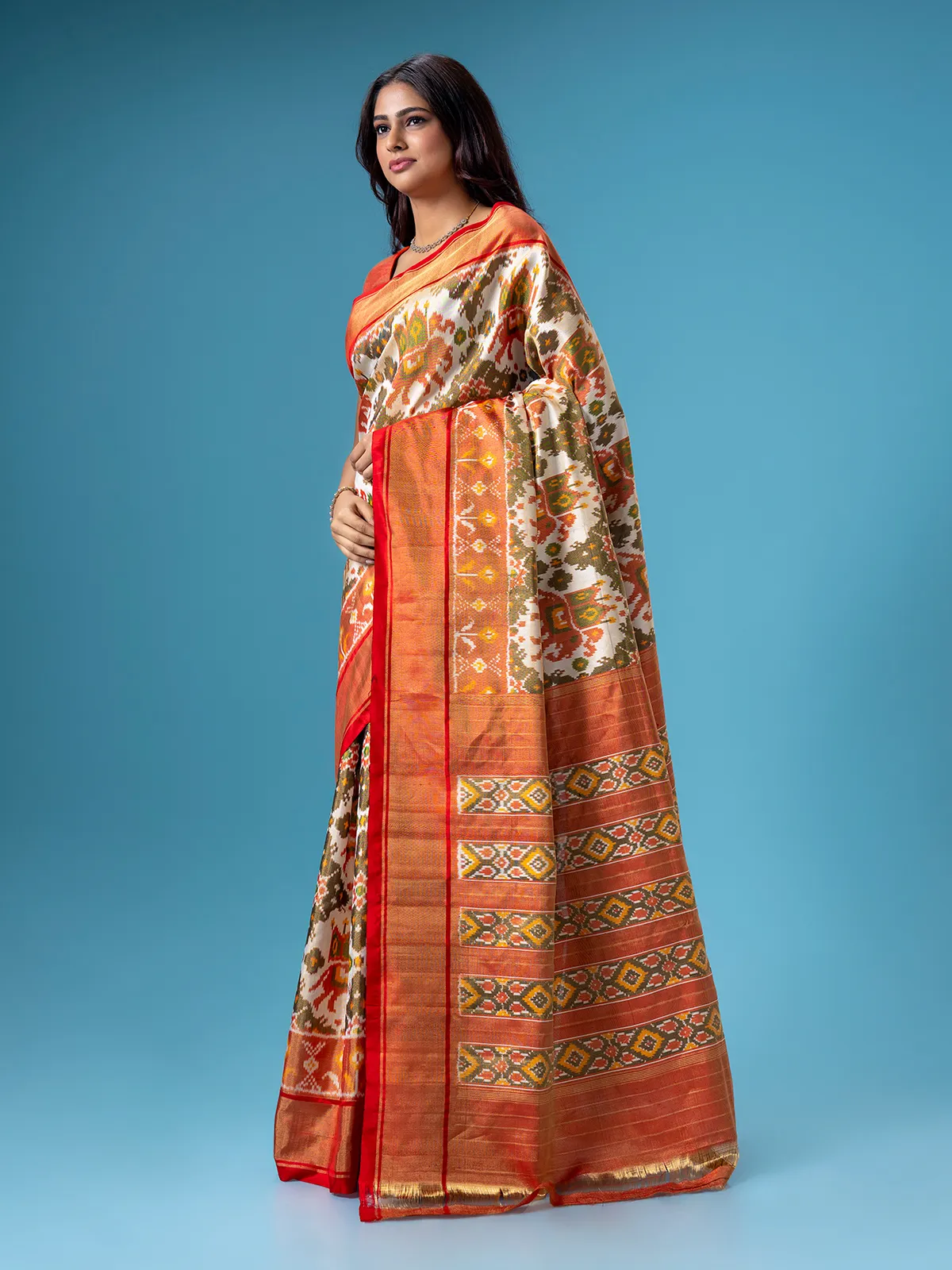 Stunning off white patola printed saree