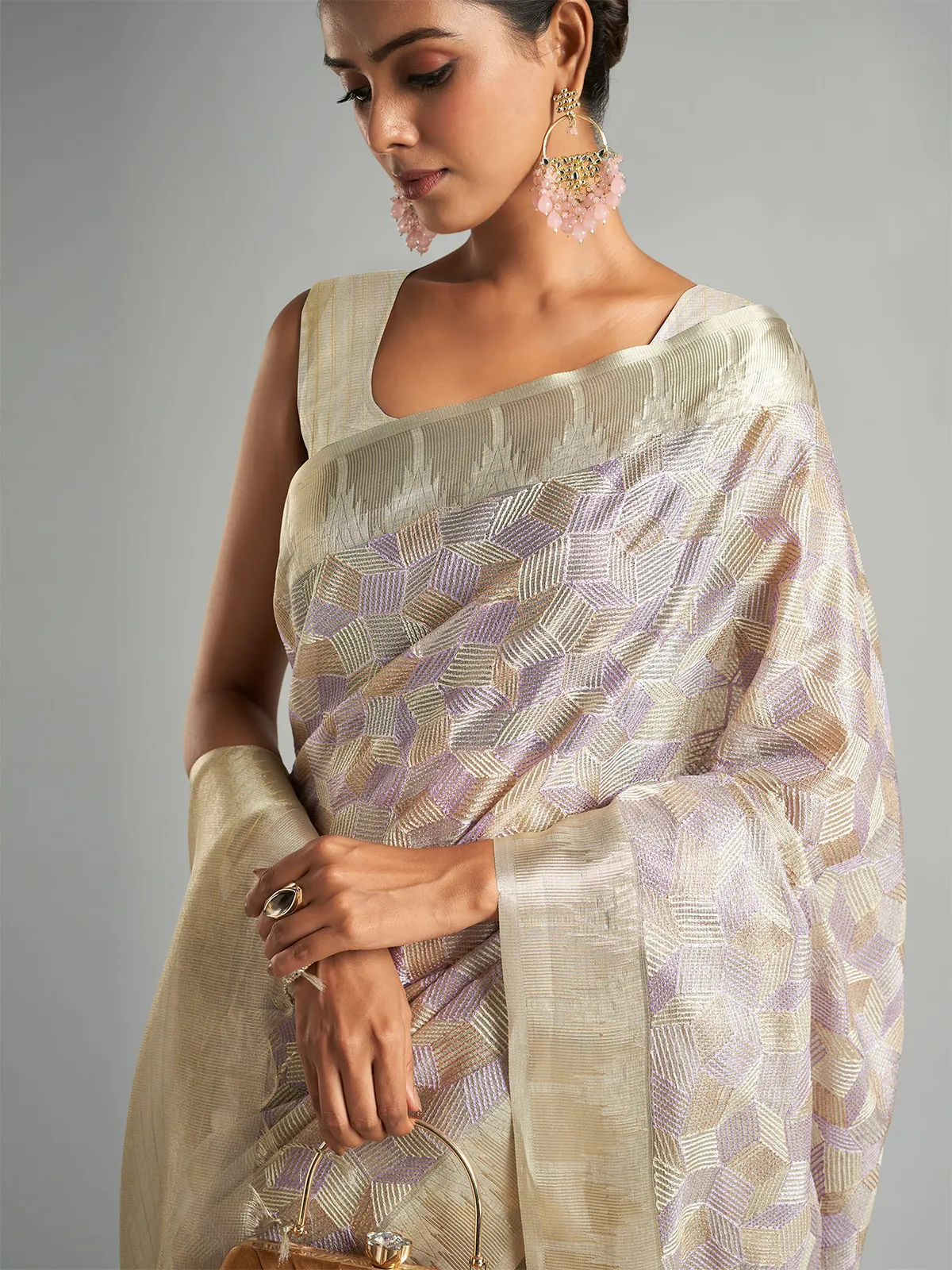 Stunning off-white tissue silk saree