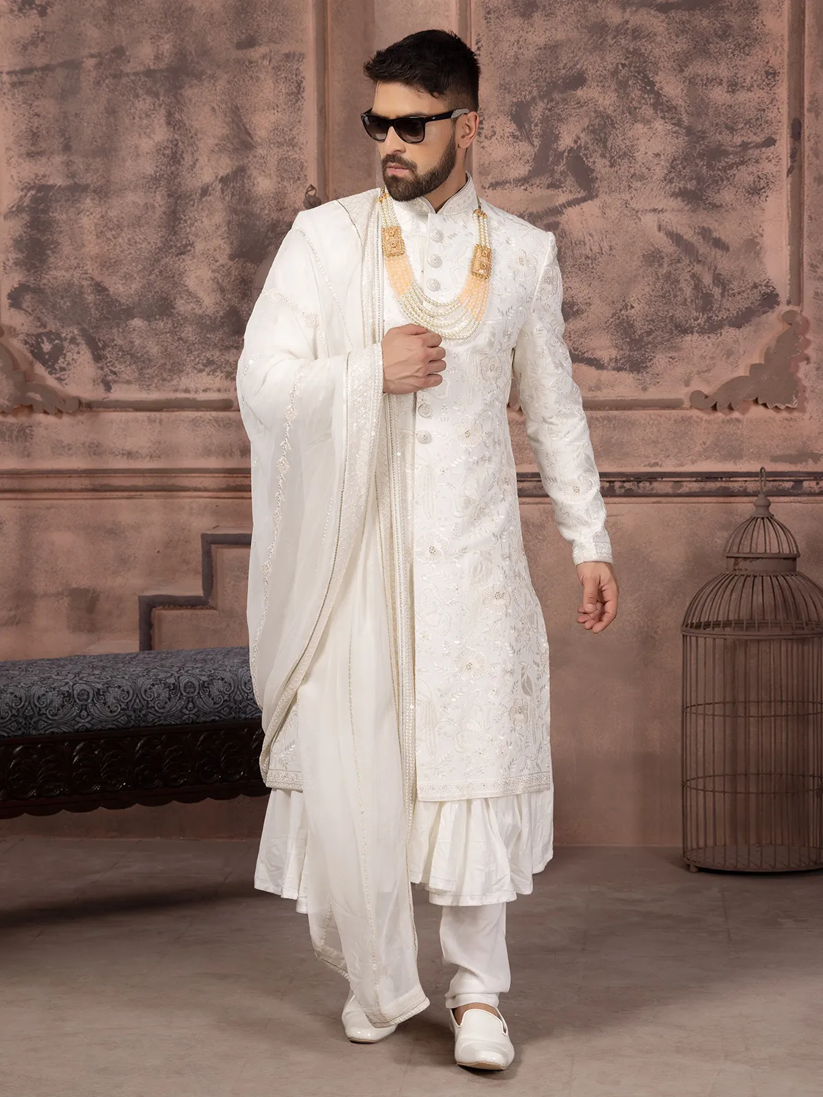 Stunning silk white groom sherwani