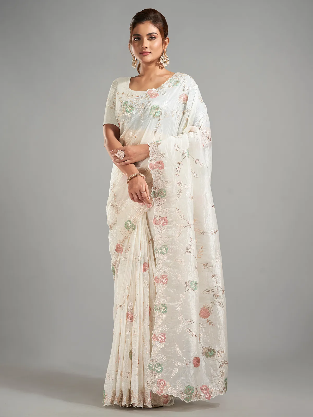 Stunning white tissue silk saree