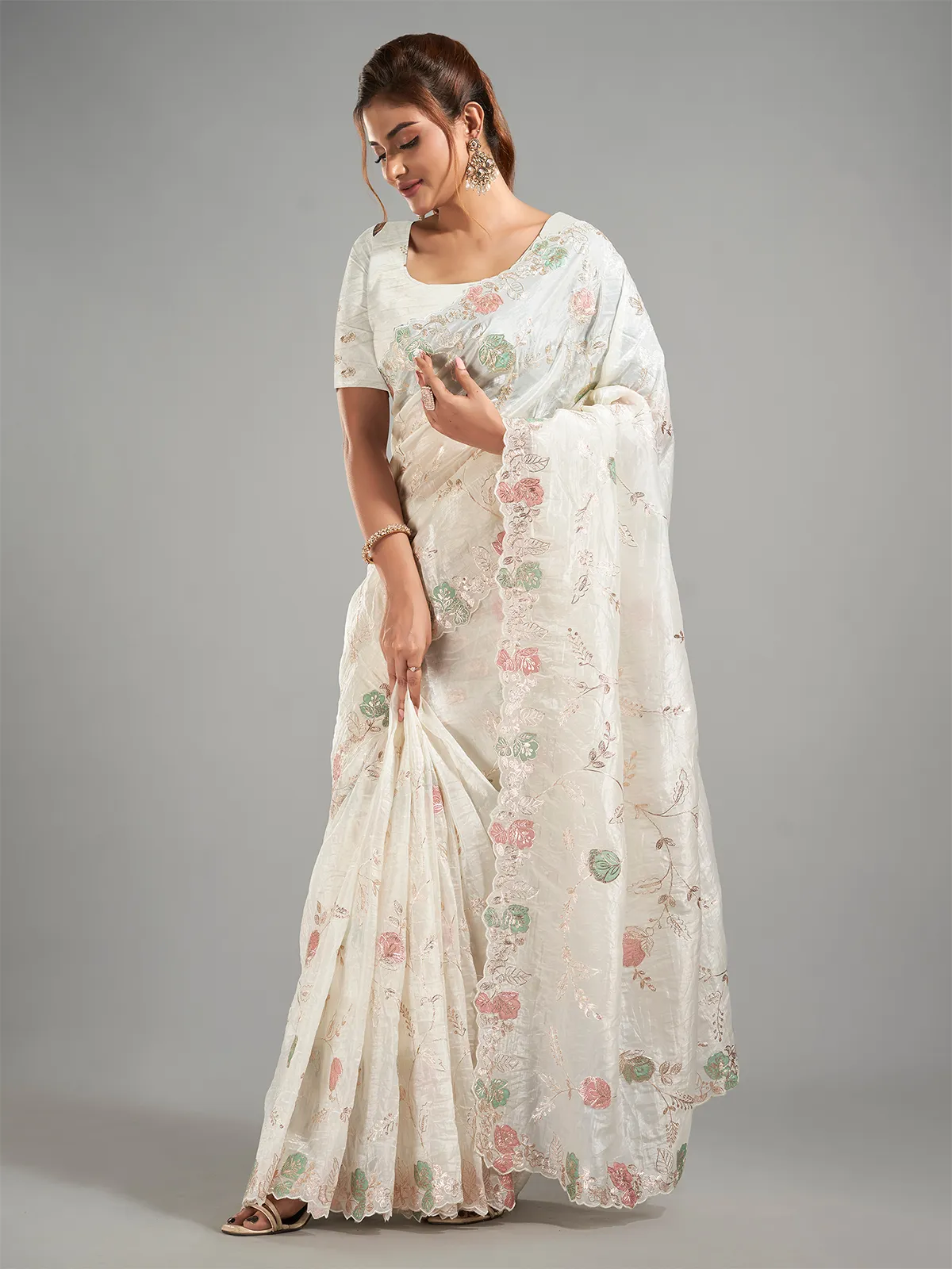 Stunning white tissue silk saree