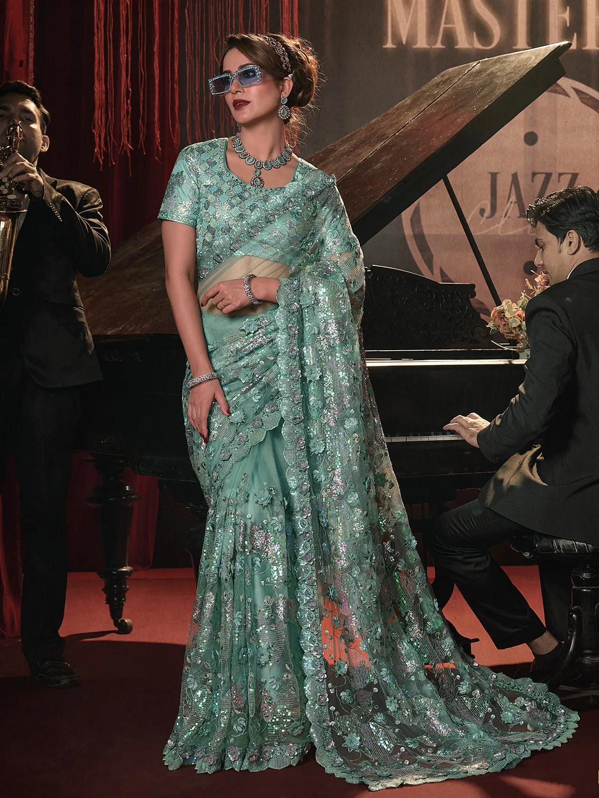 Stylish sea green net saree