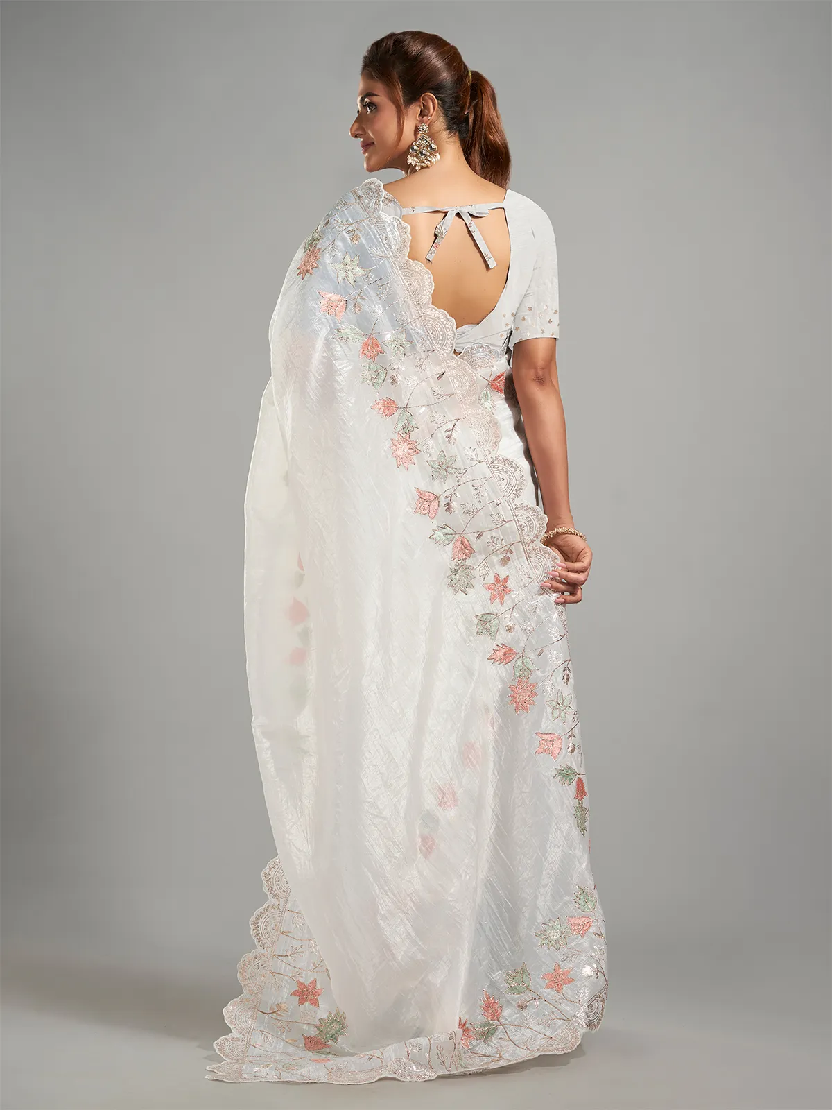 Stylish white tissue silk saree