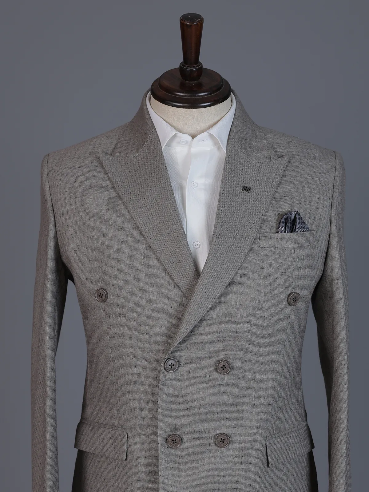 Taupe designer double breasted suit with textured birdseye peak lapel