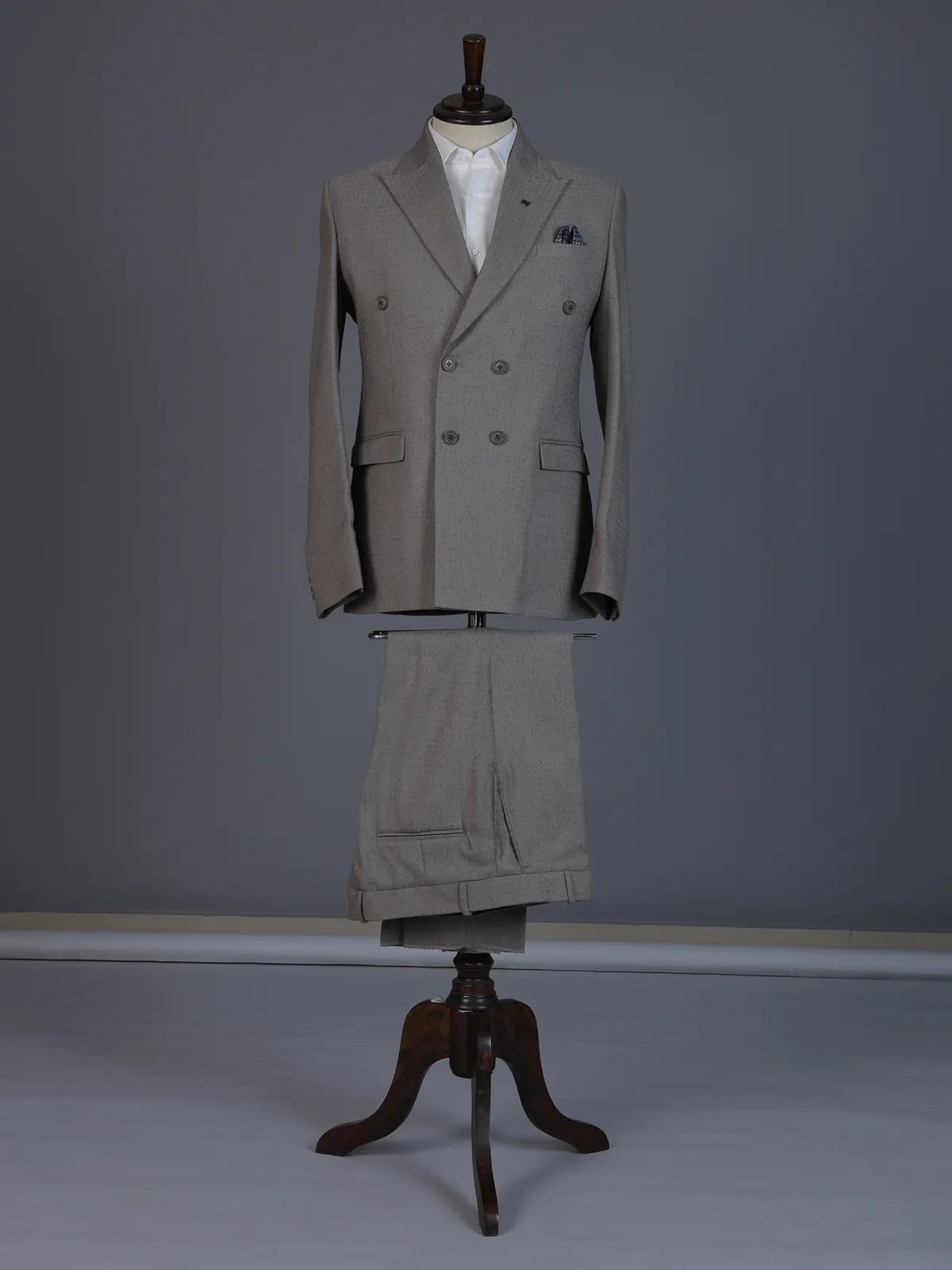 Taupe designer double breasted suit with textured birdseye peak lapel