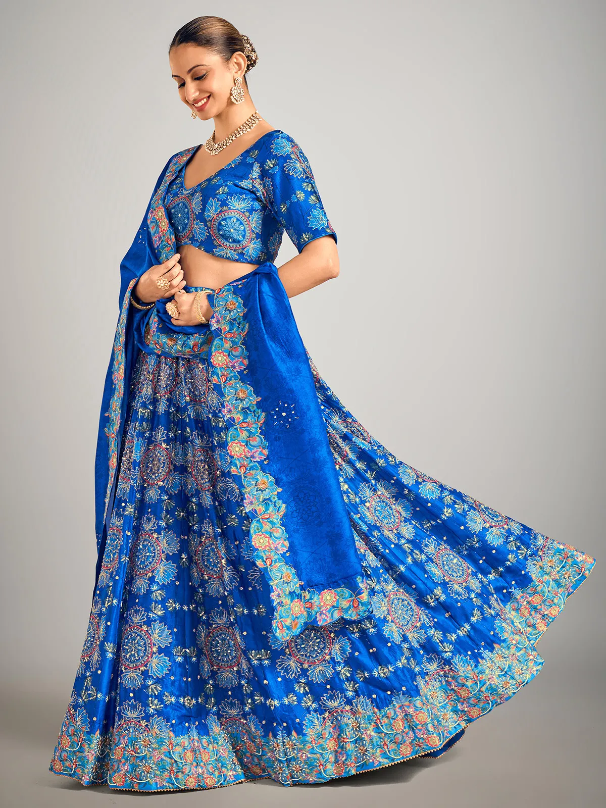 Teal blue printed silk wedding wear lehenga choli