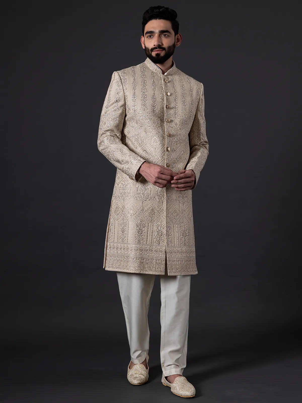 Traditional glimmerish beige silk sherwani for groom