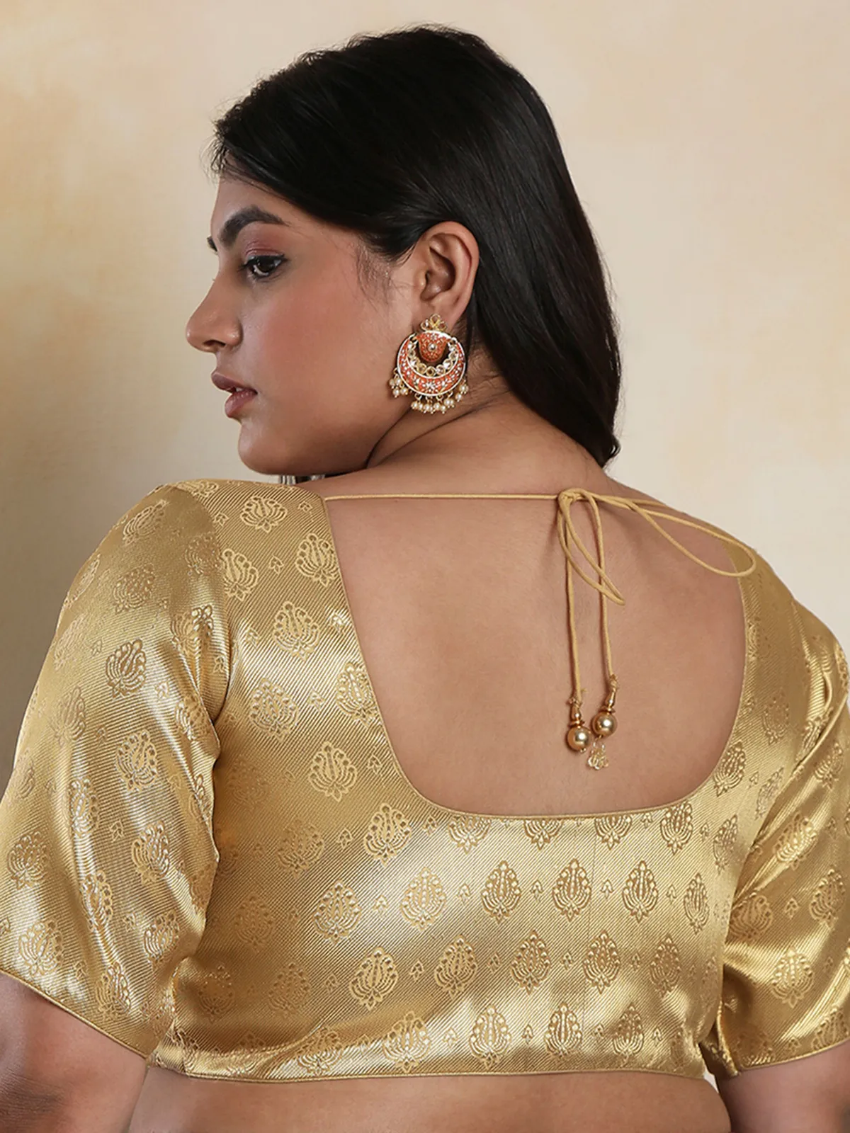 Trendy beige brocade blouse