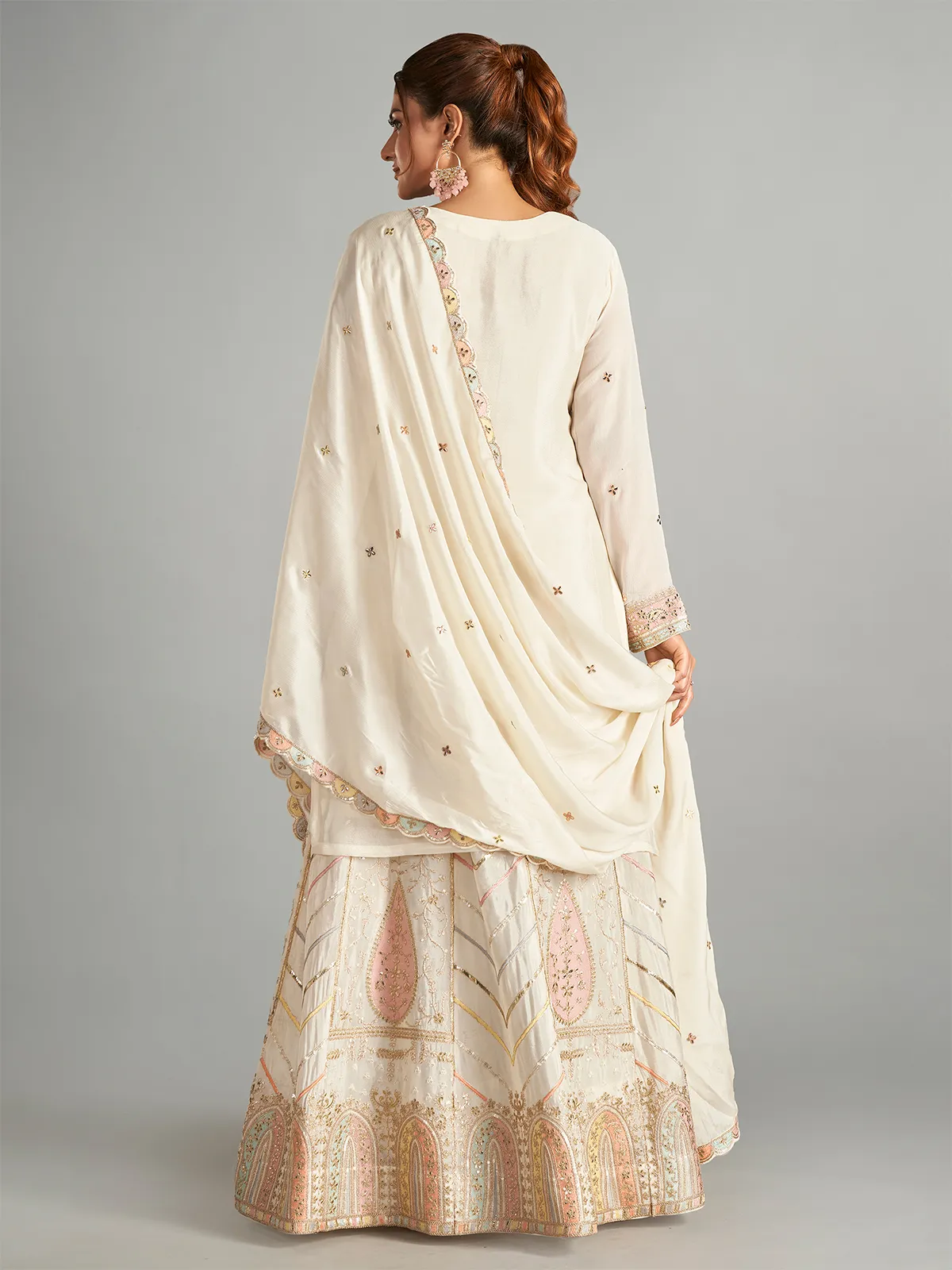 Trendy cream chiffon lehenga suit