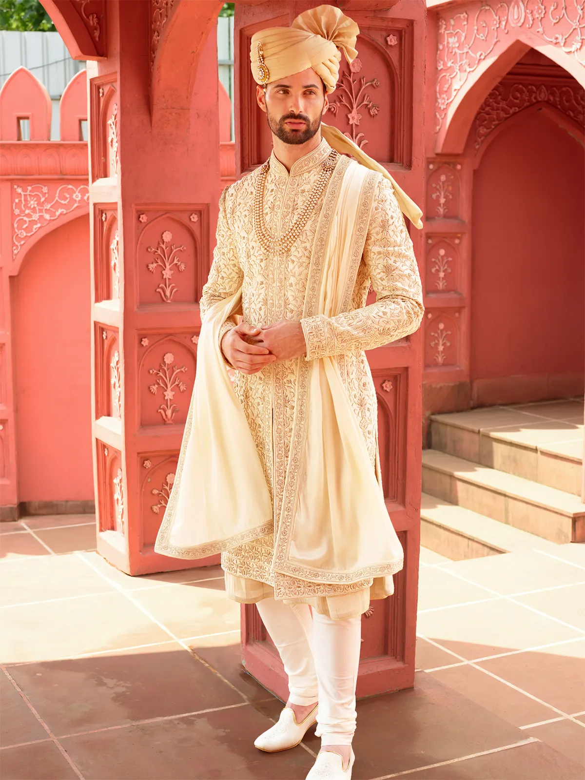 Trendy cream groom sherwani in raw silk