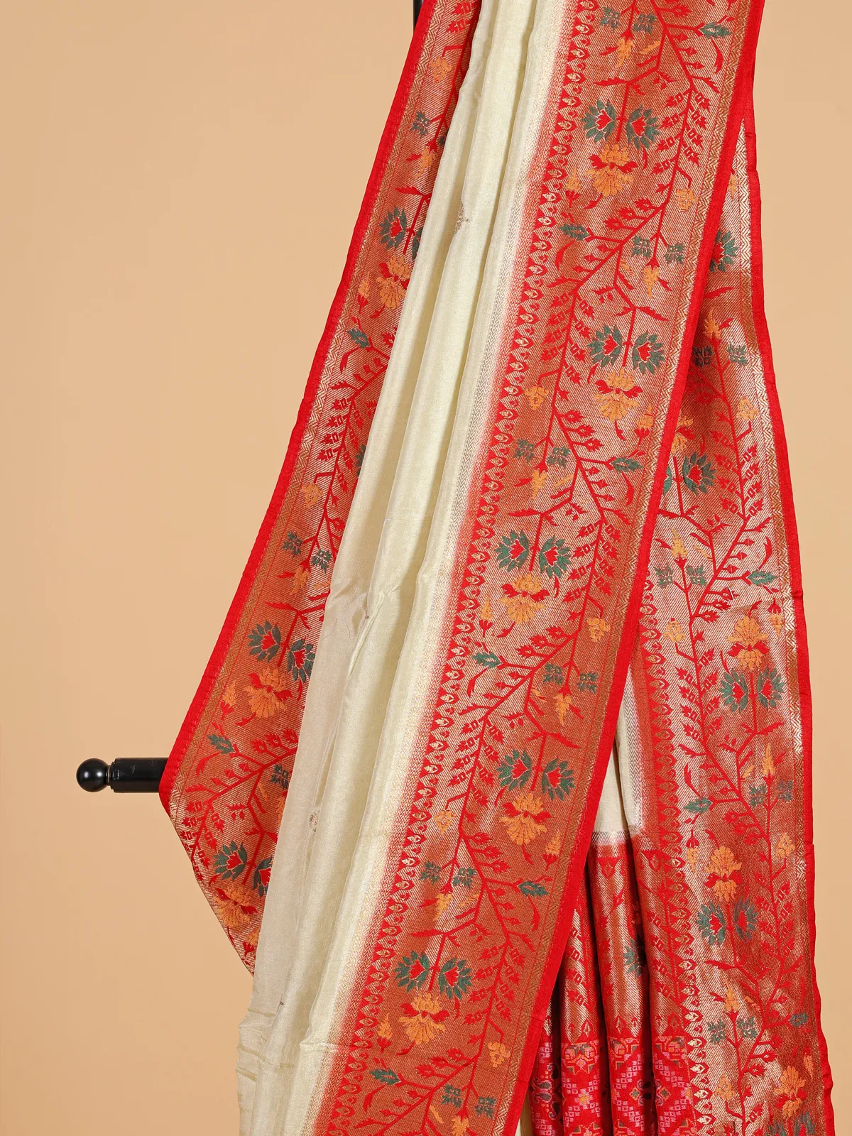 Trendy cream patola printed saree