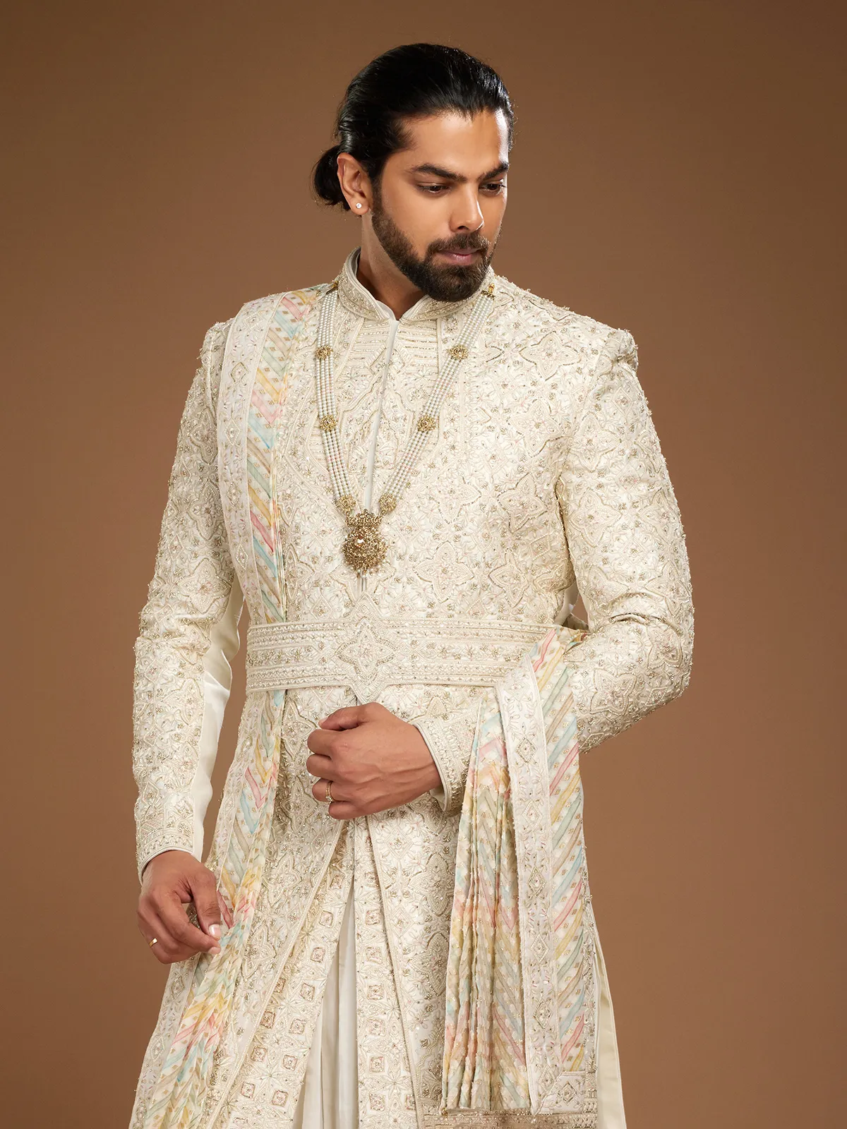 Trendy cream sherwani for groom