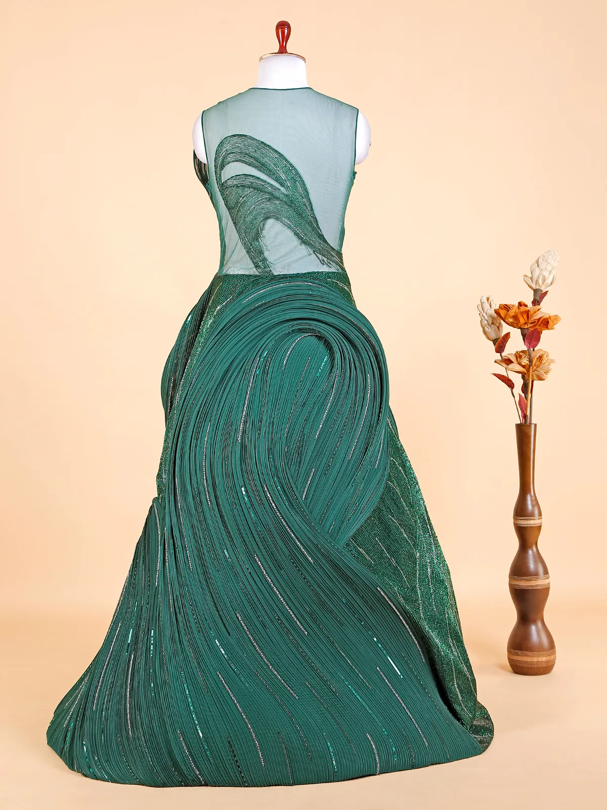 Trendy dark green designer gown