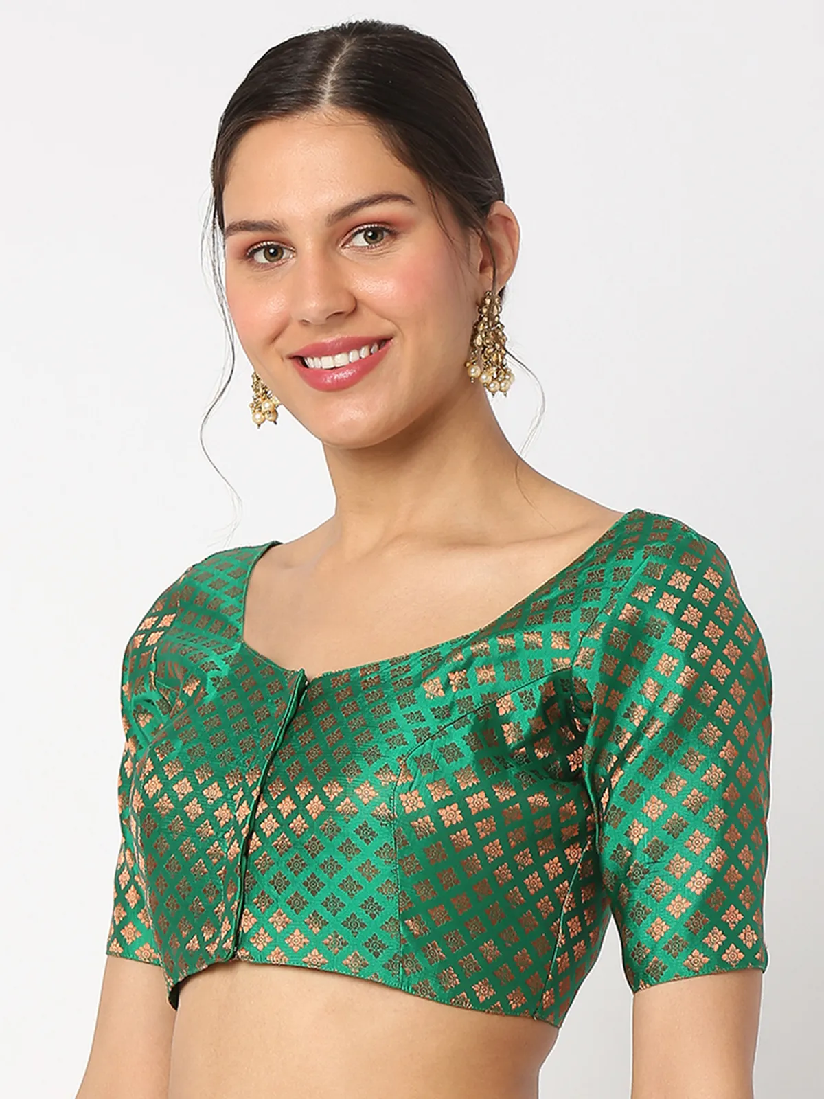 Trendy green brocade blouse