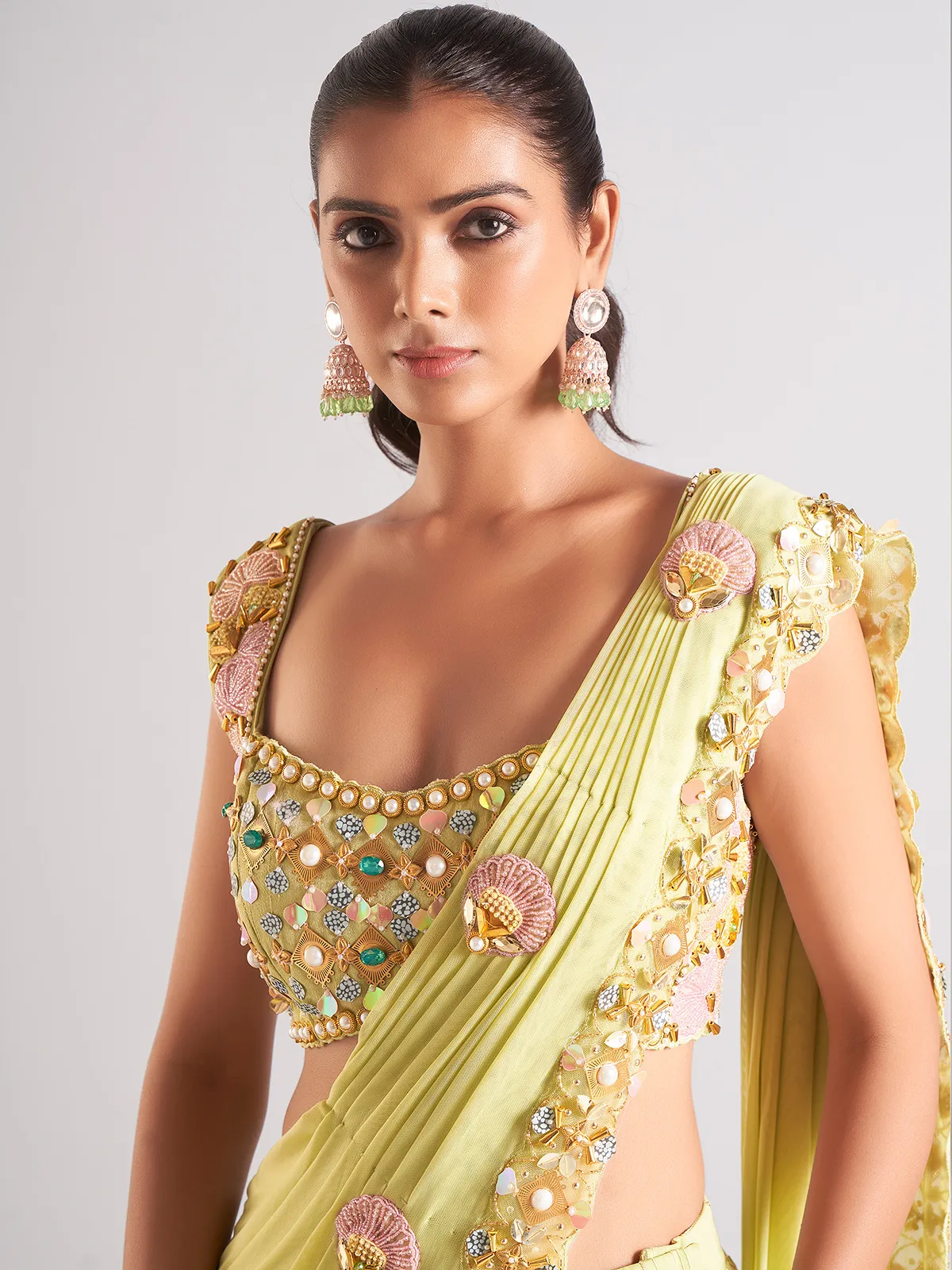 Trendy light green georgette saree