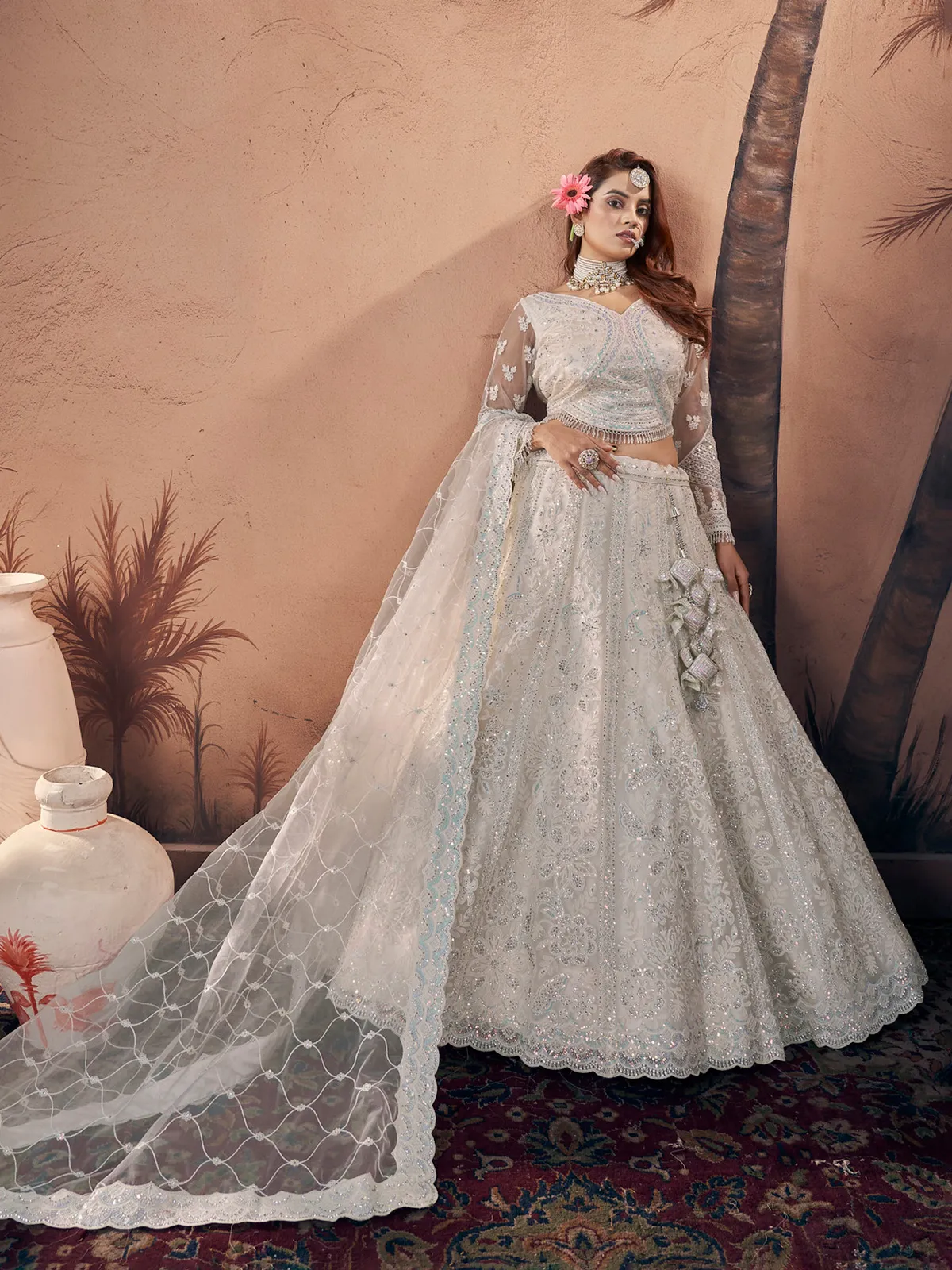 Trendy off-white net lehenga choli for bridal
