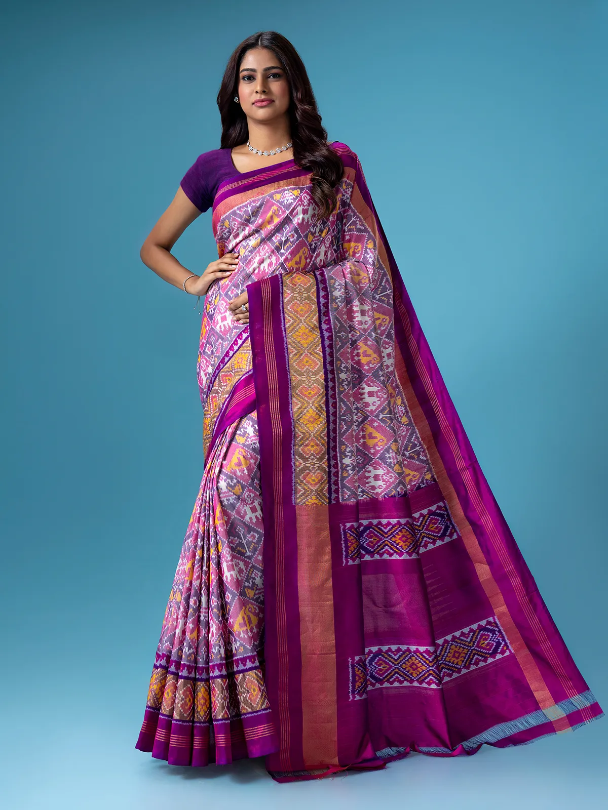 Trendy purple patola printed saree