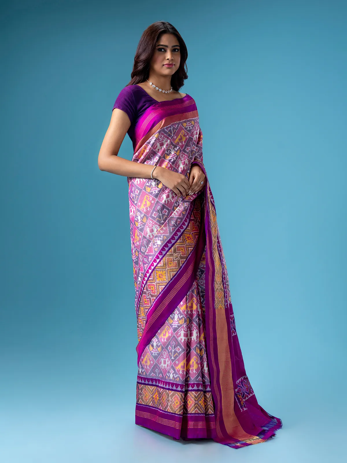 Trendy purple patola printed saree